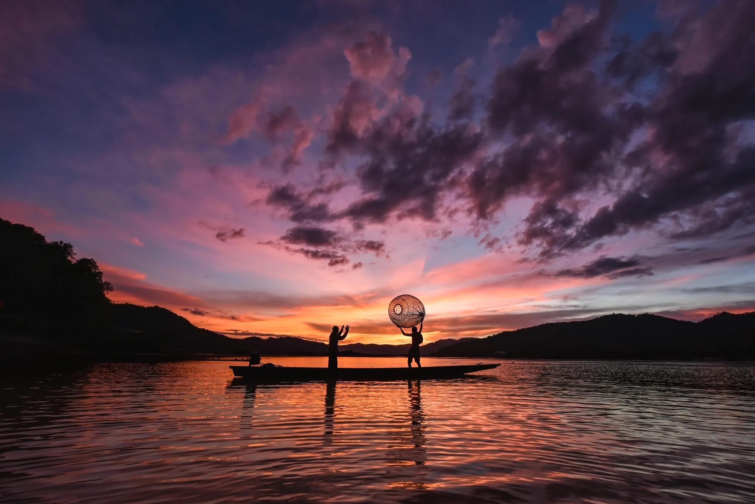 Mekong river fish sunset