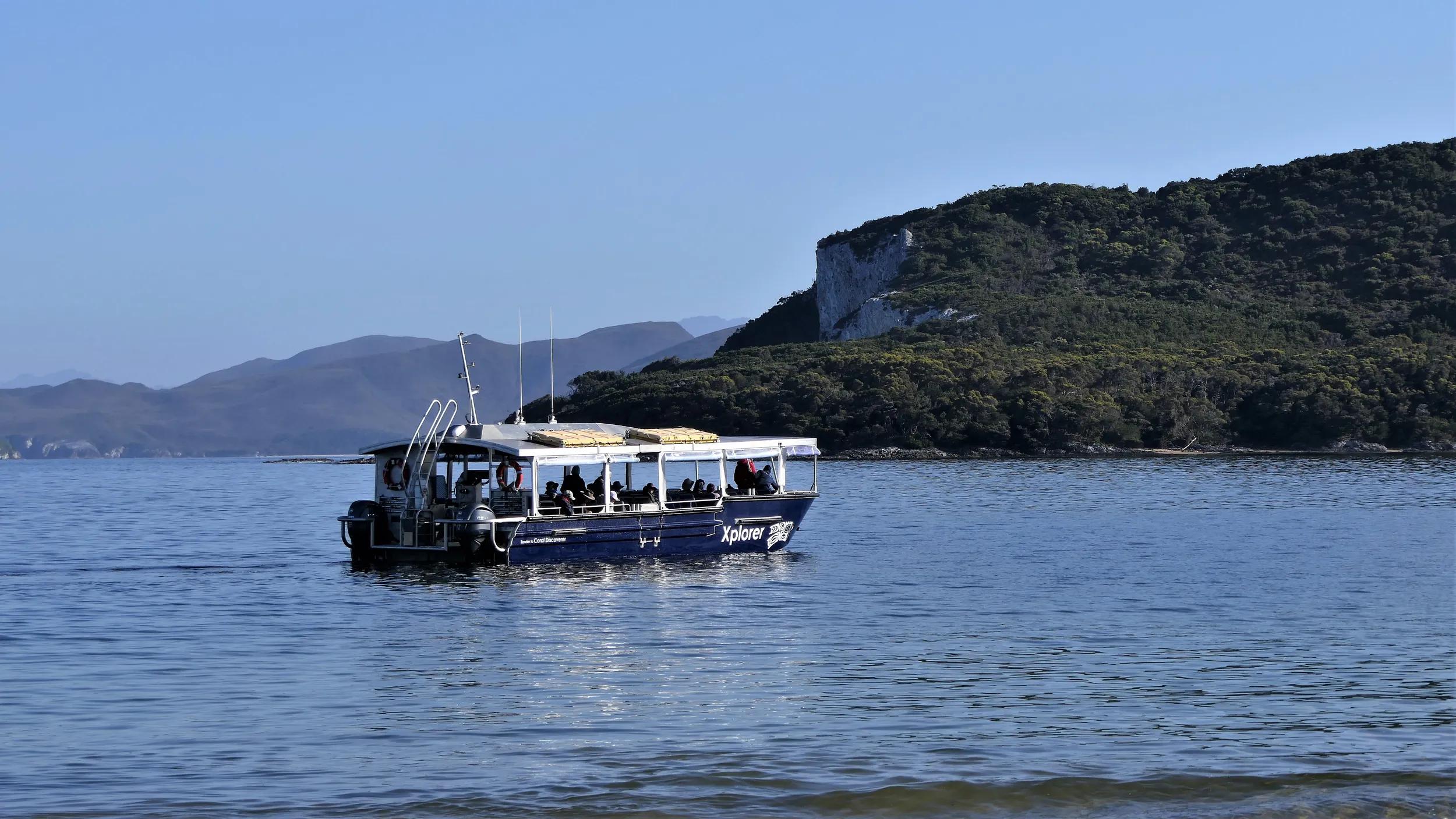 Coral Expeditions Xplorer tender 2023 - New Xplorer waiting to pick up guests at Adventure Bay.