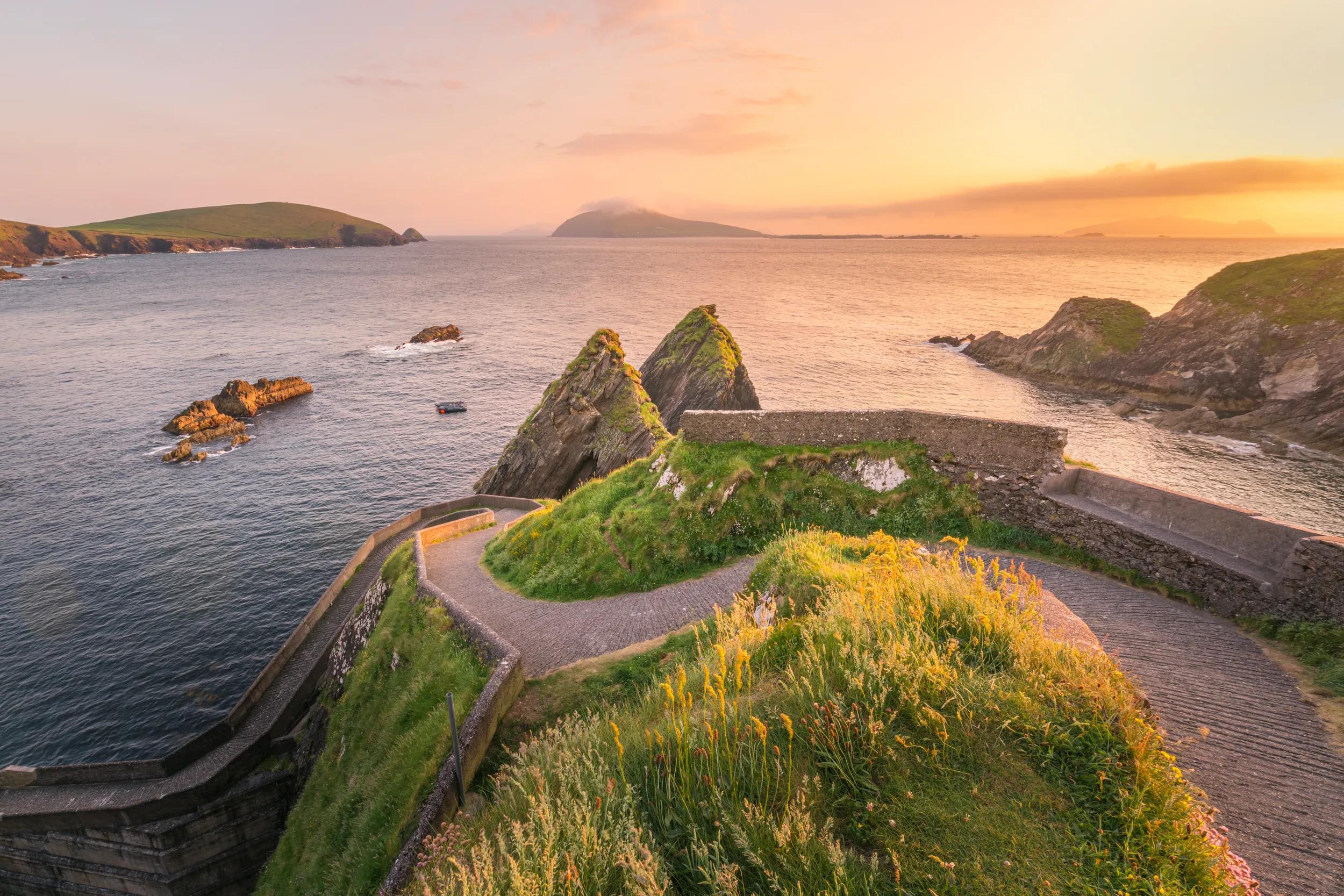 Republic of Ireland, Munster province, County Kerry: high angle view of the road leading to the pier for Blasket islands ferry.