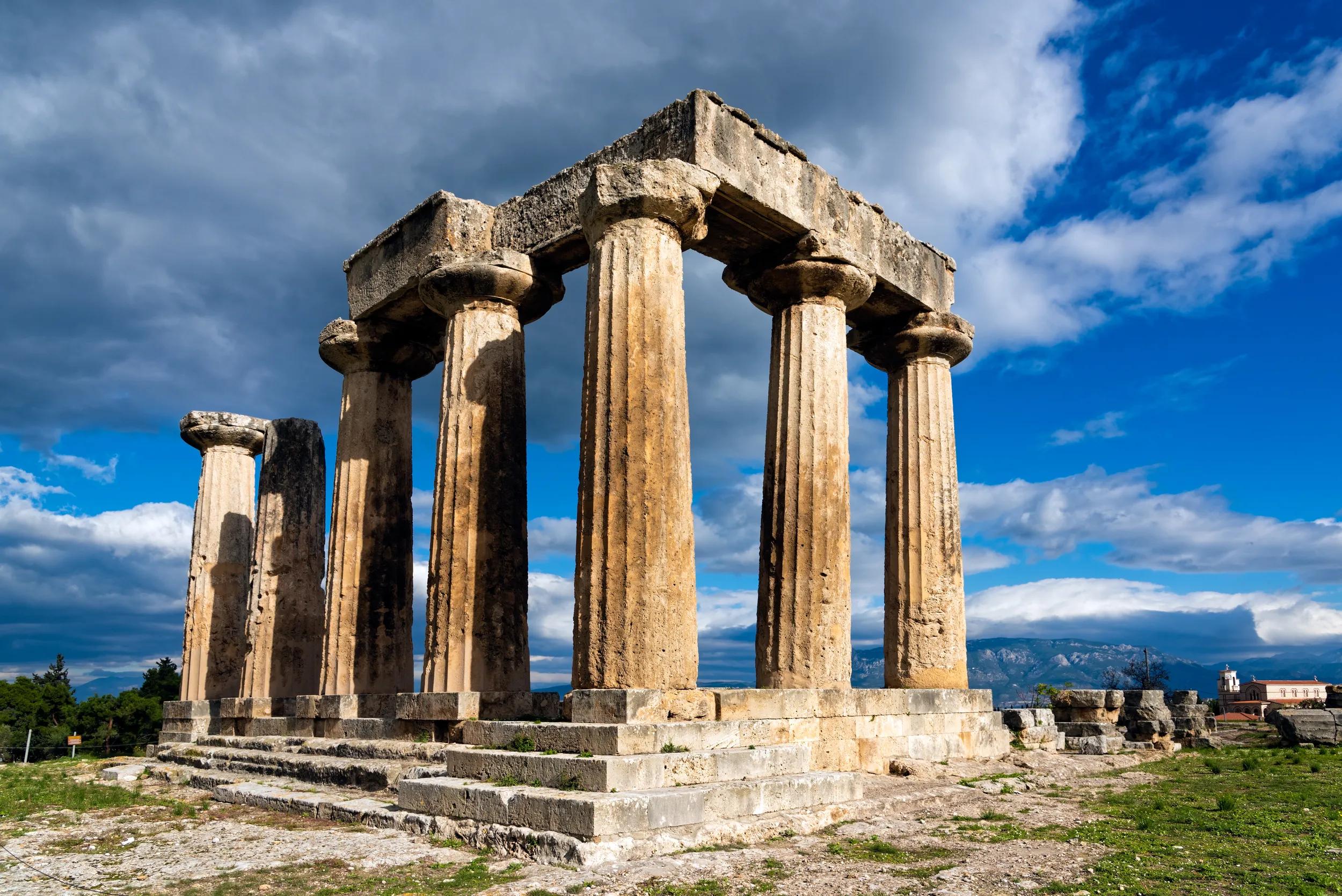 The remains of the Temple of Apollo in the archaeological site of Corinth in Peloponnese, Greece