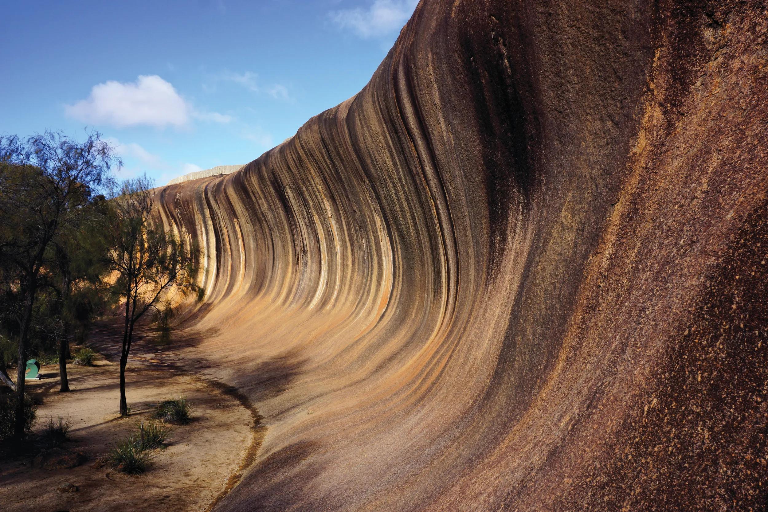 Wave Rock is a natural rock formation that is shaped like a tall breaking ocean wave.