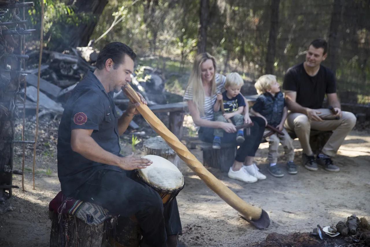 Man playing didgeridoo, Koomal Dreaming Cultural Experiences, W.A.