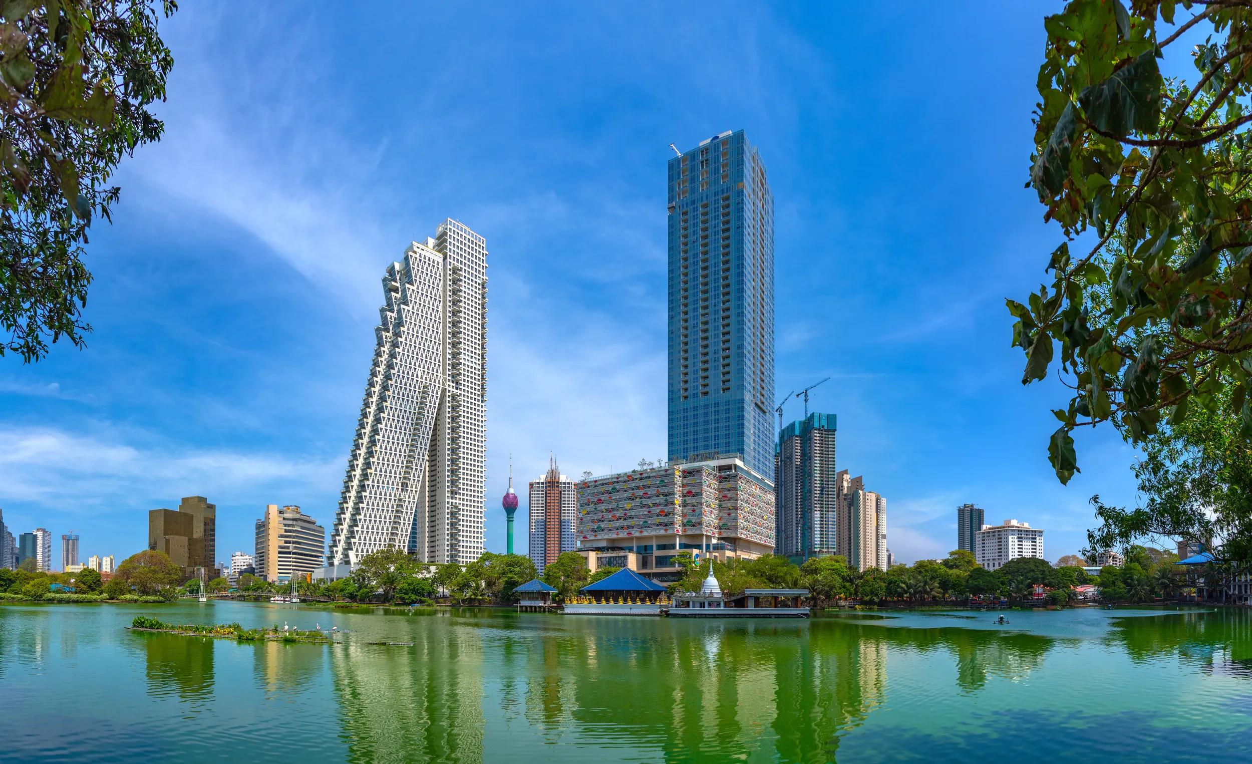 Skyline of Colombo behind South Beira lake, Sri Lanka.
