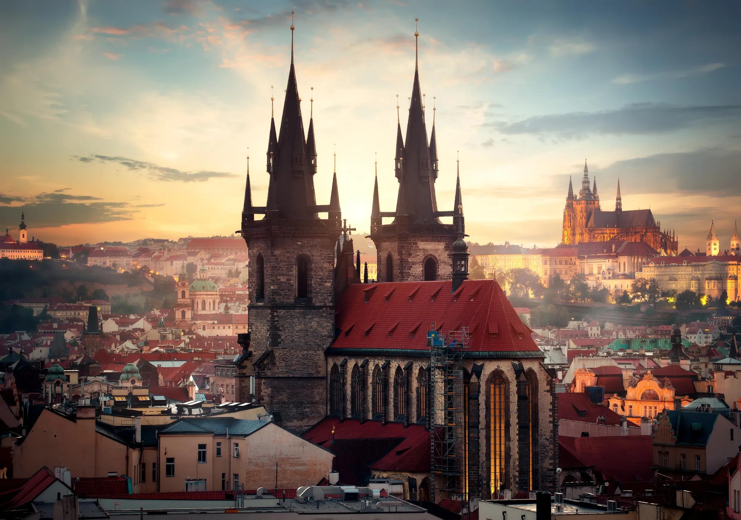 Ancient cathedrals of Prague at sunrise. View from above