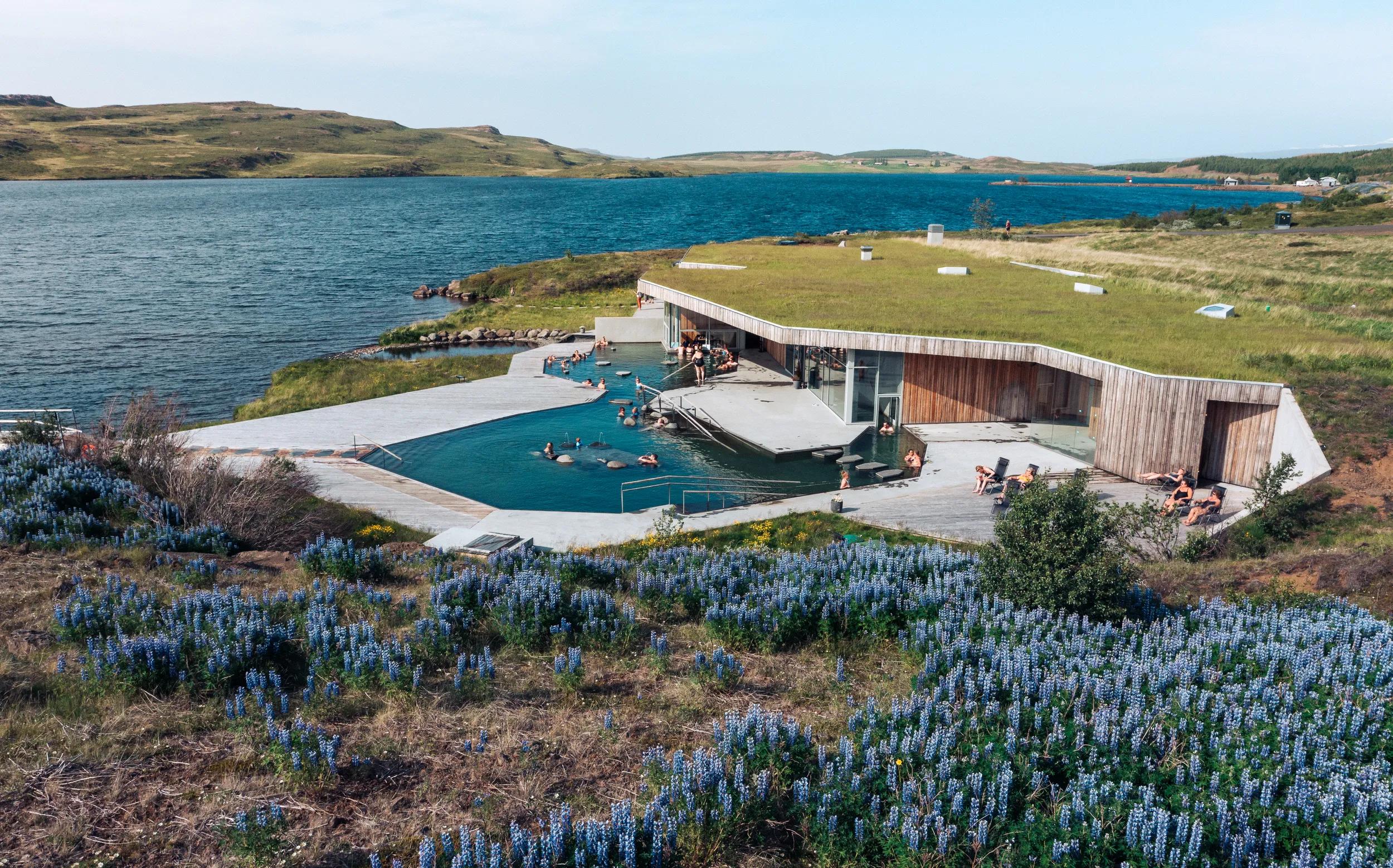 People at Vök Baths geothermal pools, Iceland.