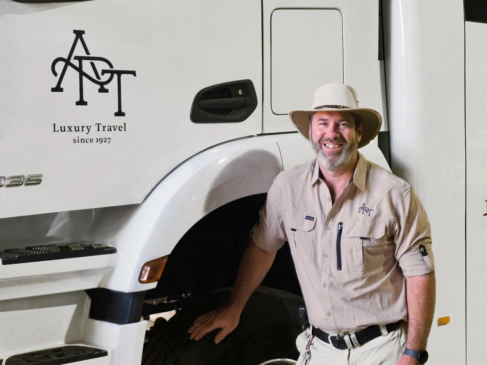 APT Coach Driver Scott Harvey in new APT logo uniform and coach.