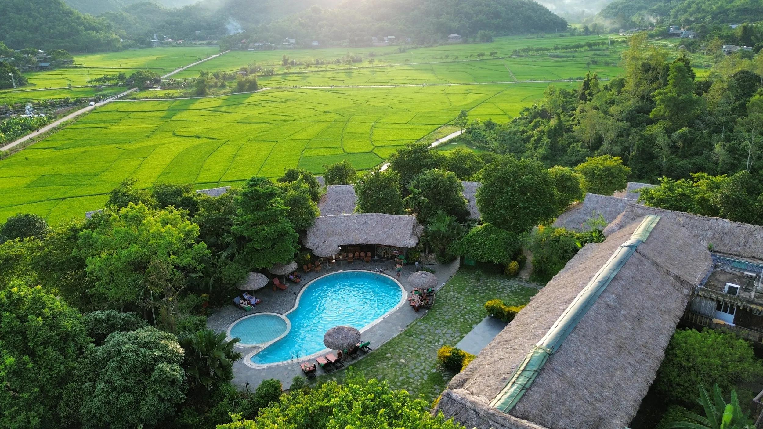 Mai Chau Ecolodge, green season, aerial view, pool.