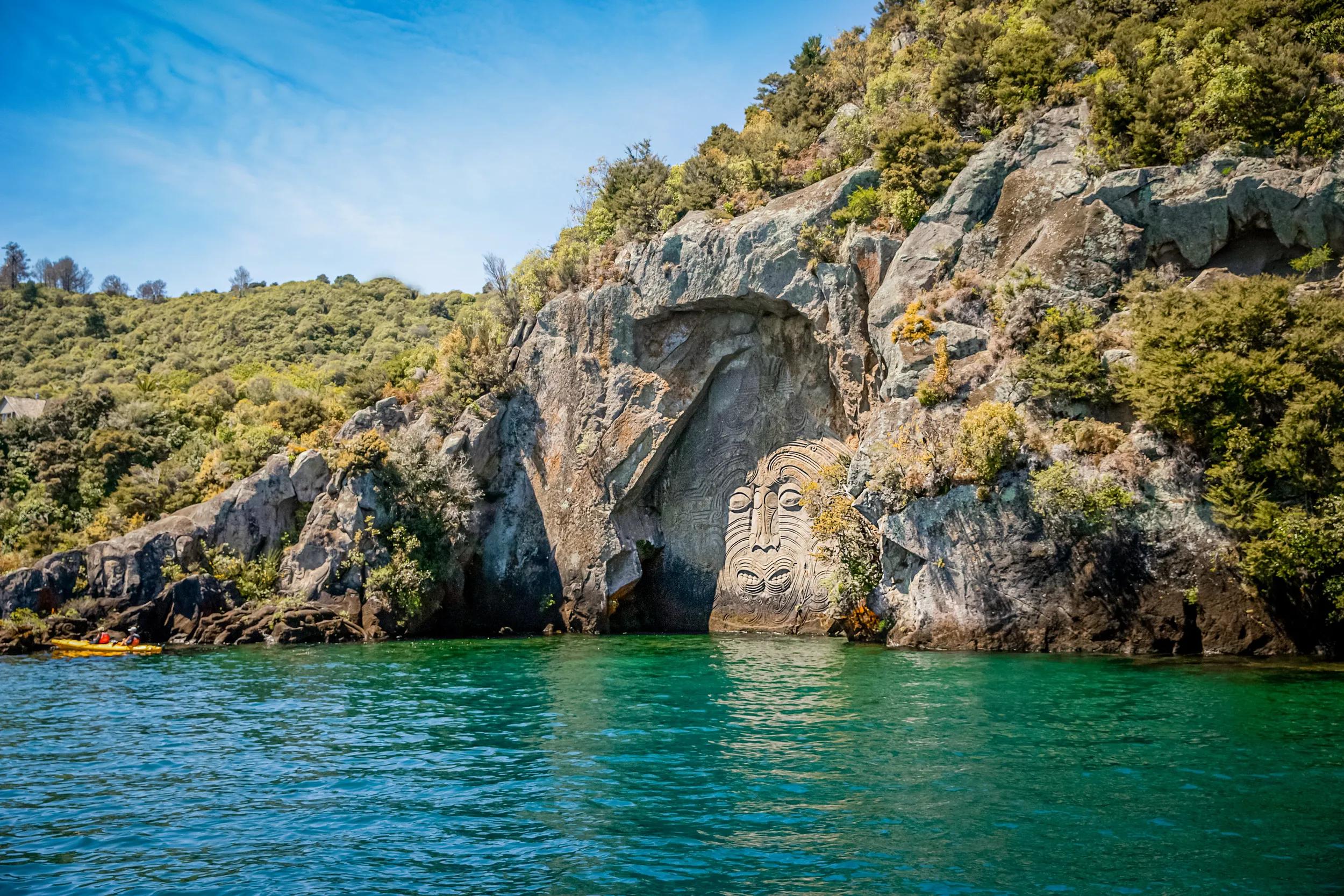 traditional rock carving lake taupo north island new zealand. High quality photo