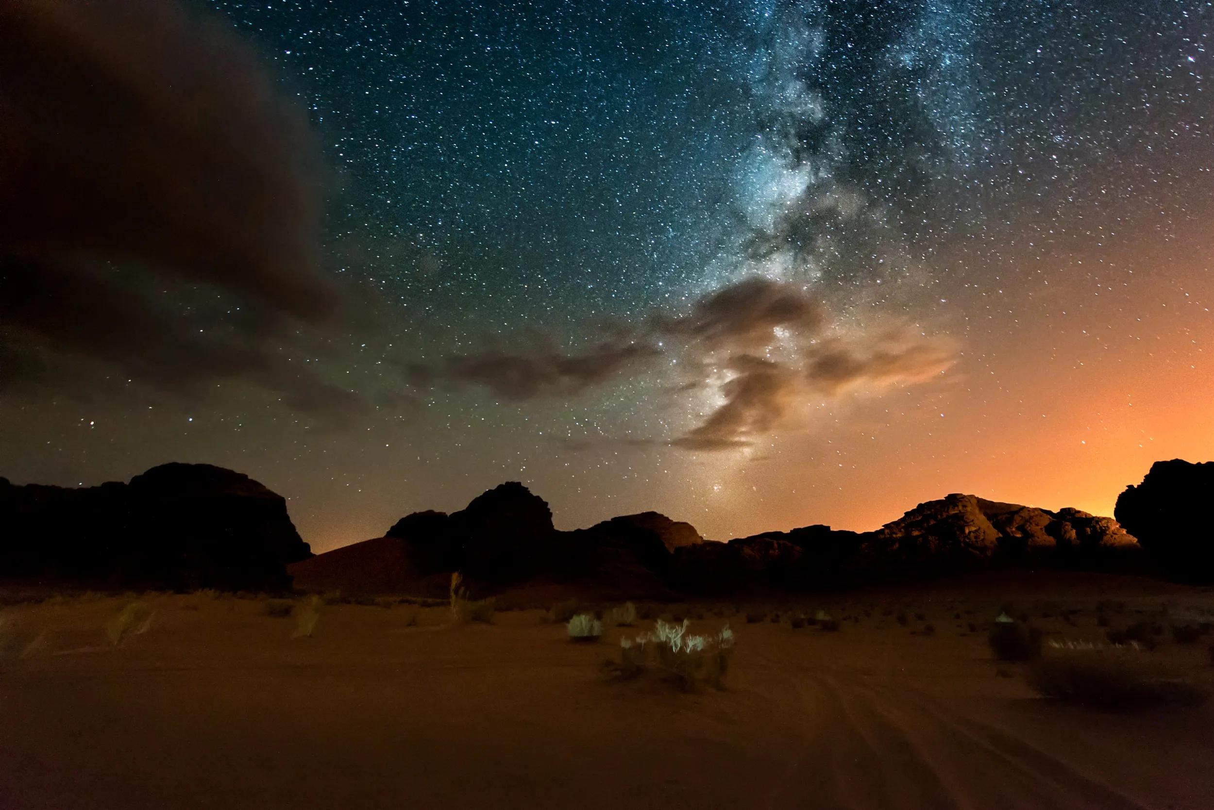 Milky way above red Wadi Rum desert in Jordan. ,
