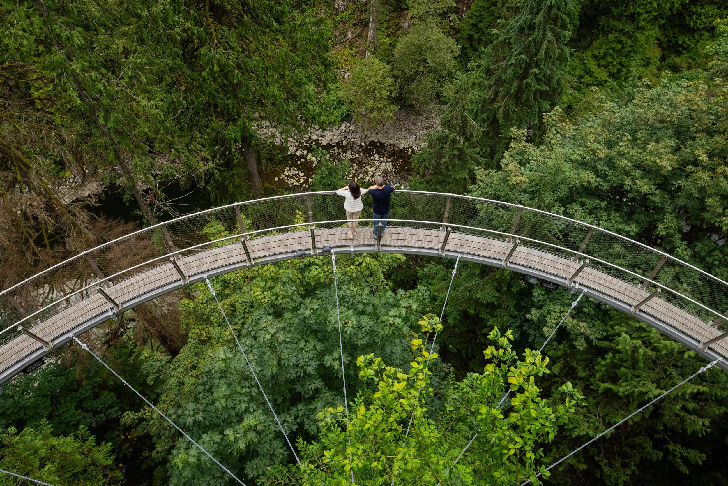 Couple at the Capilano Suspension Bridge Park, North Vancouver, British Columbia, Canada.