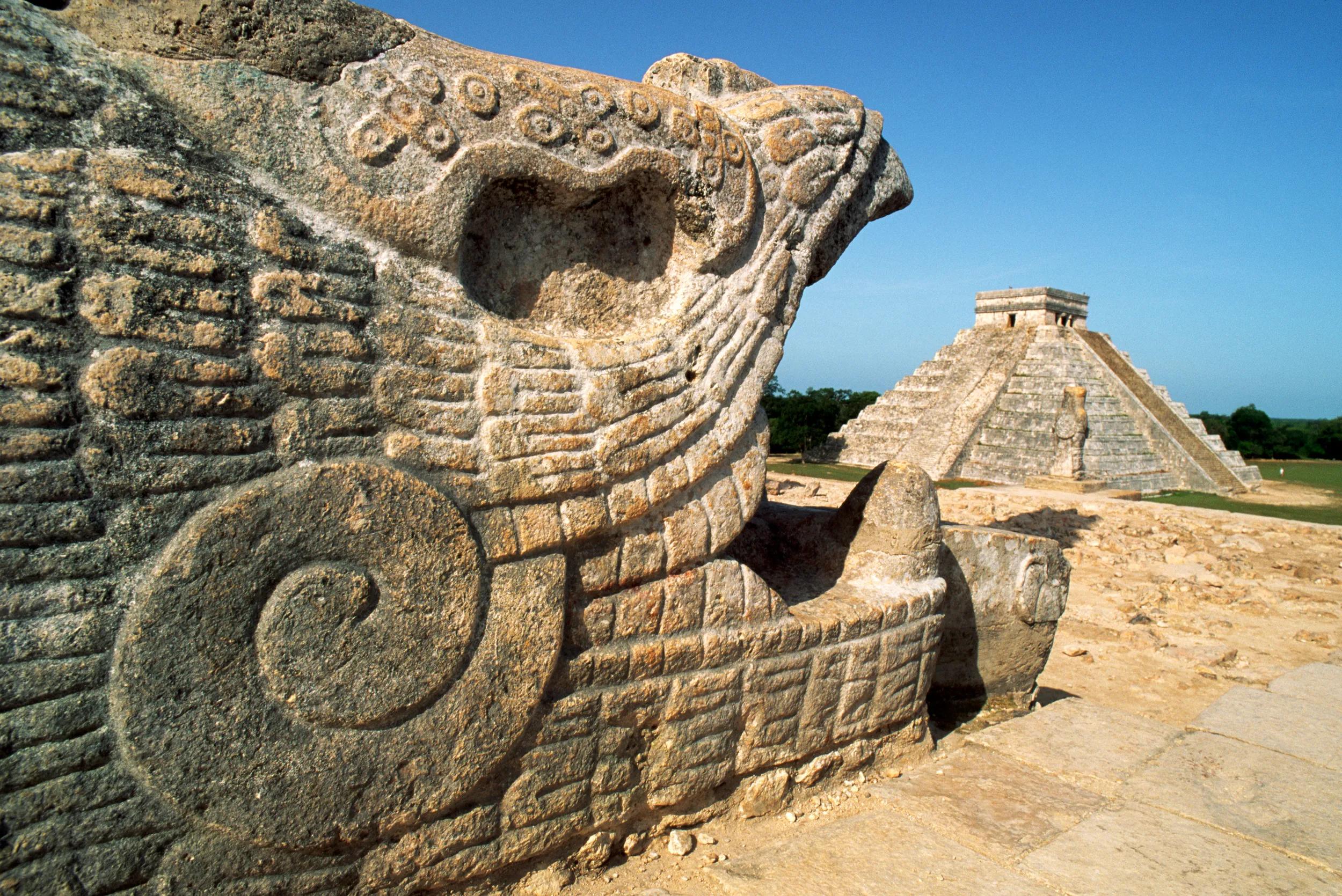 A stone carving adorns the Temple of the Warriors, which stands next to the Pyramid of Kulkulcan, or El Castillo, in Chichen Itza, an ancient Mayan city.
