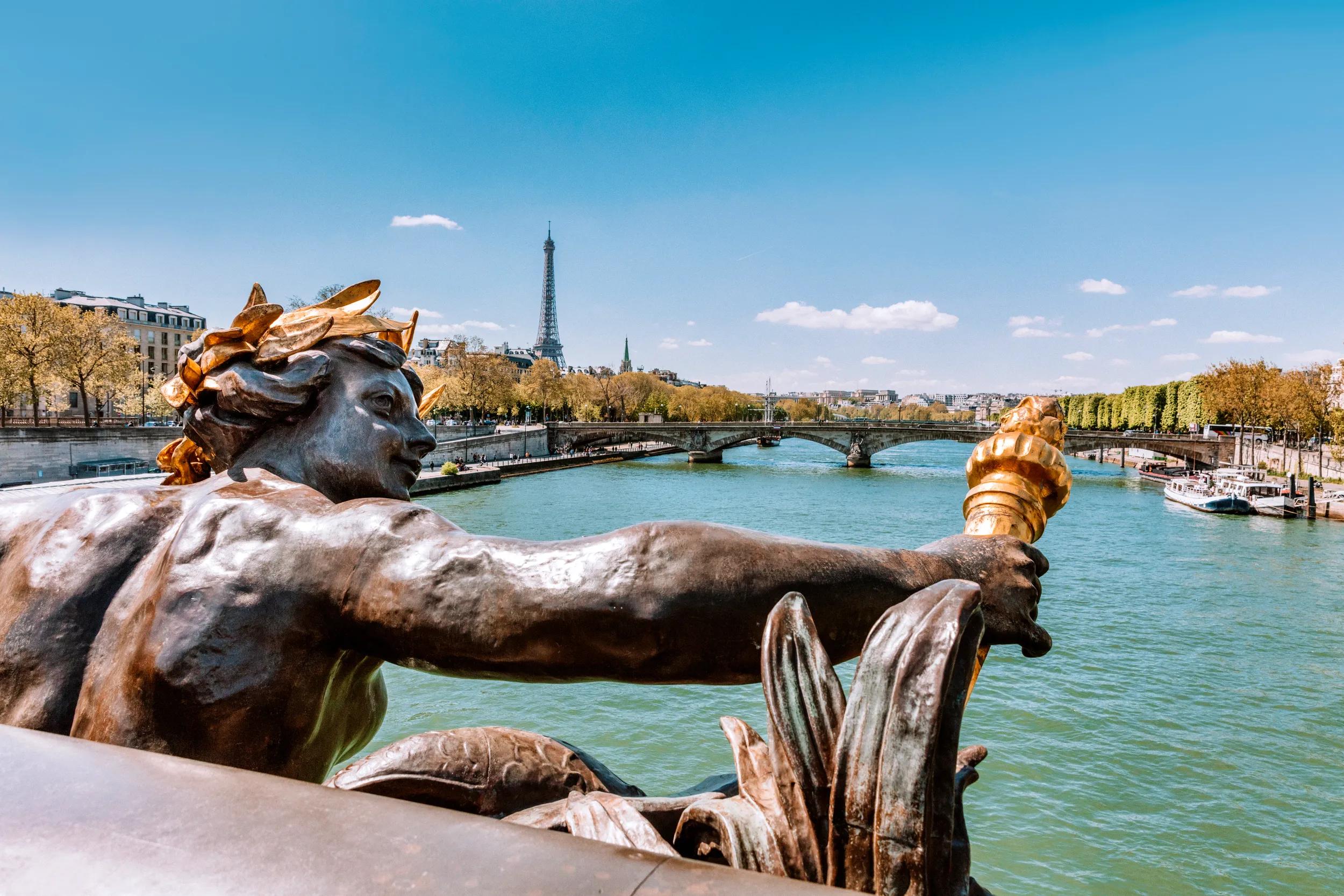 Eiffel Tower and Pont Alexandre III Bridge in Paris, France