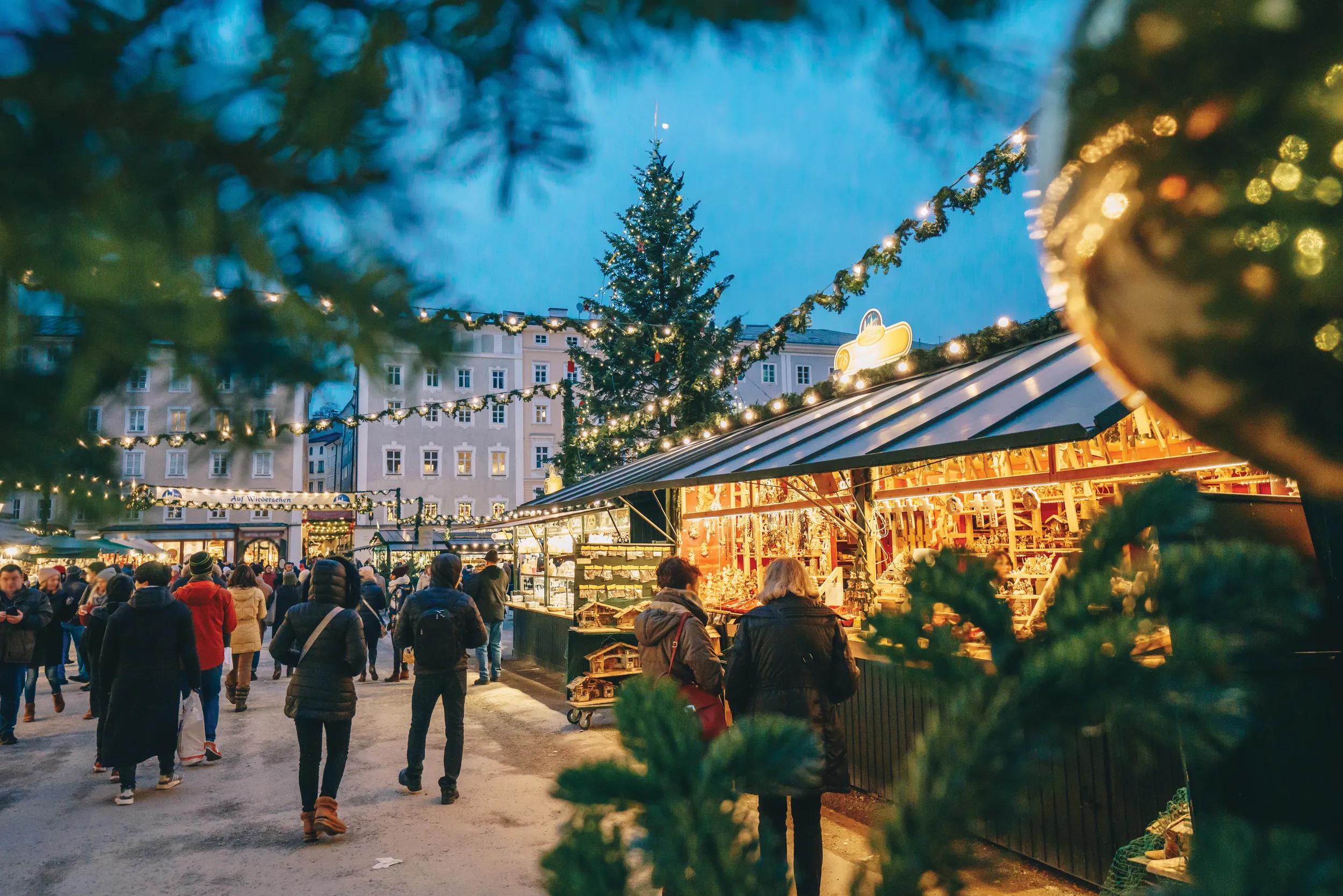 Salzburg Christmas Market seen trough a Christmas tree branches