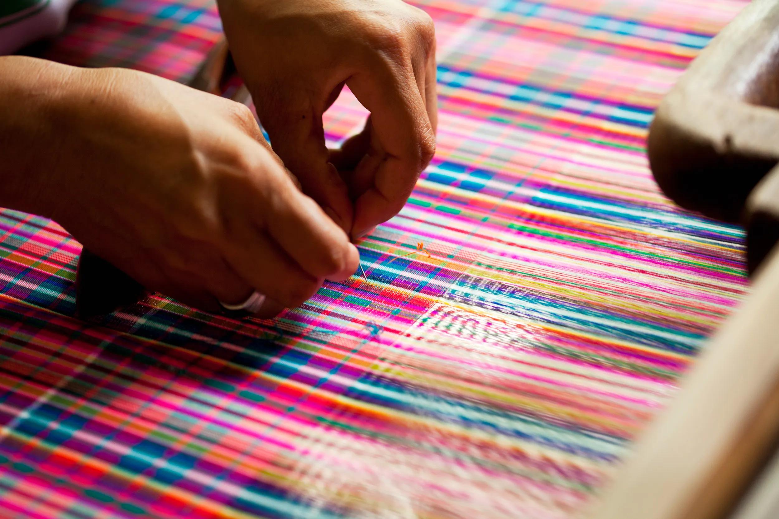 Colorful silk threads on the loom