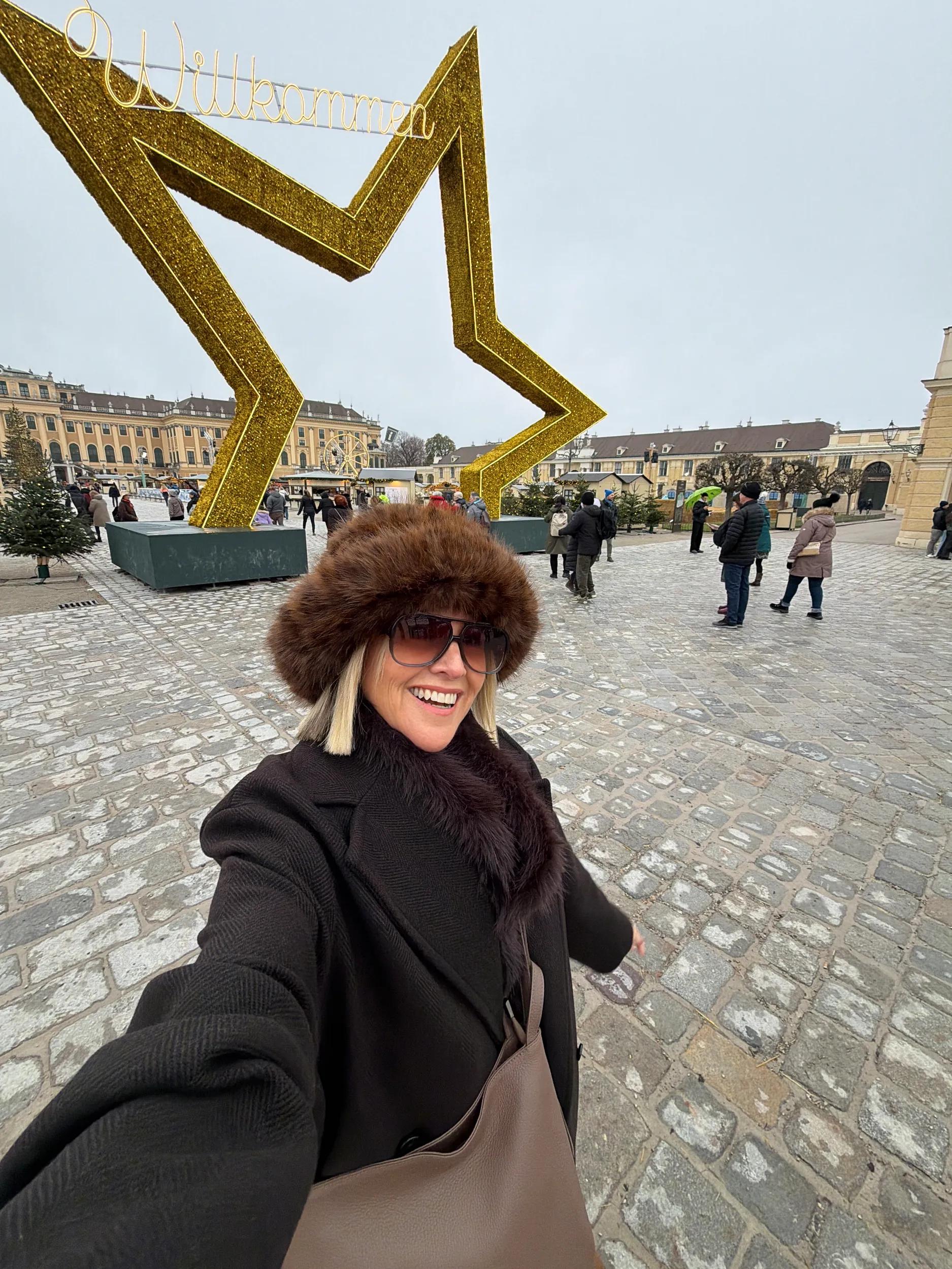 Influencer Nikki Parkinson at The Schönbrunn Christmas Market, Austria. TM European Gems Cruise.