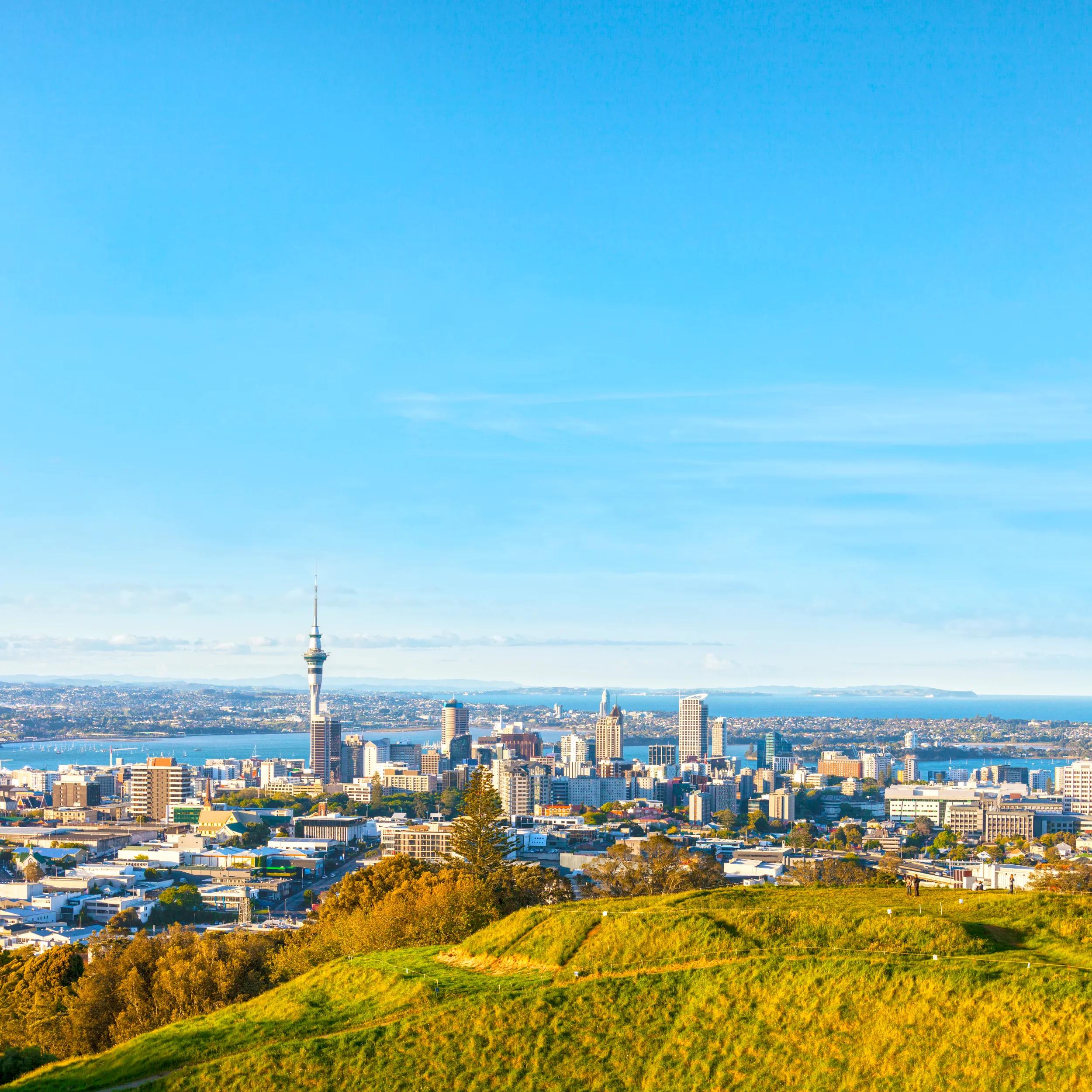 Auckland, New Zealand, from the volcano Mount Eden, the crater rim is in the foreground.