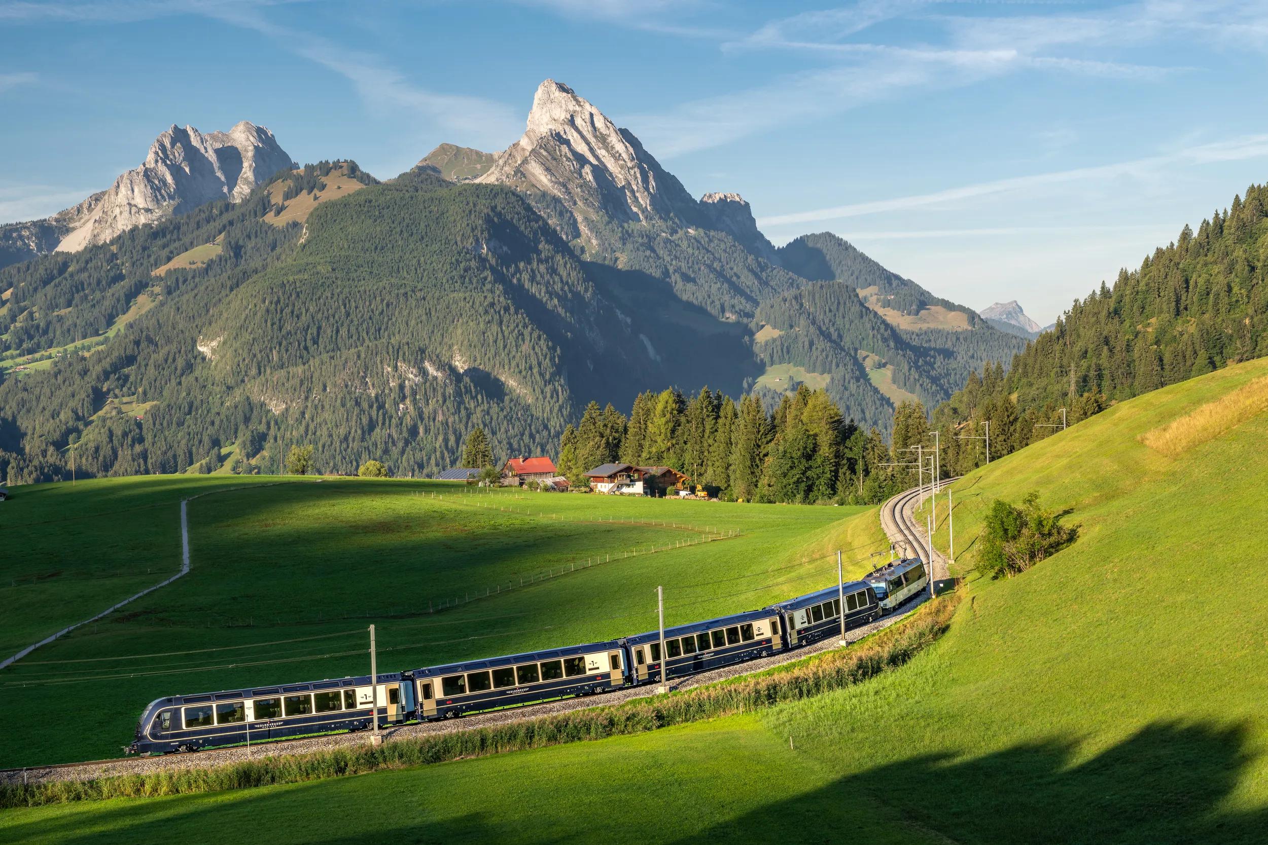 GoldenPass Express train in the morning in Schönried, Bernese Oberland.