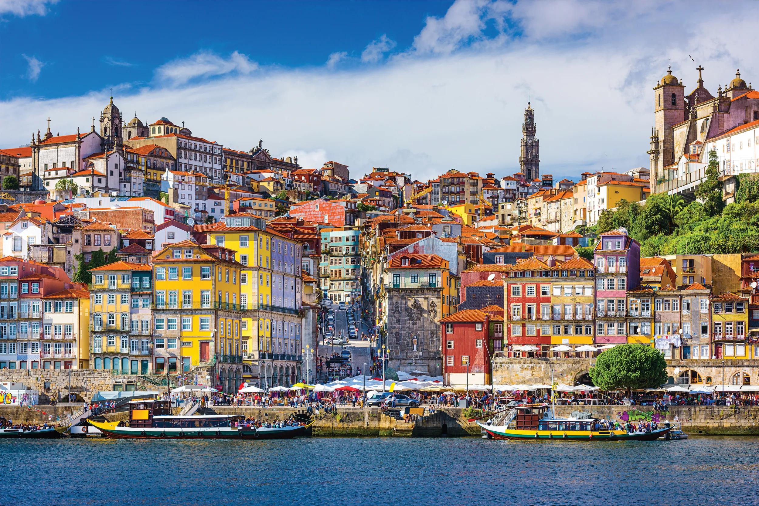 Porto, Portugal old town skyline from across the Douro River.
