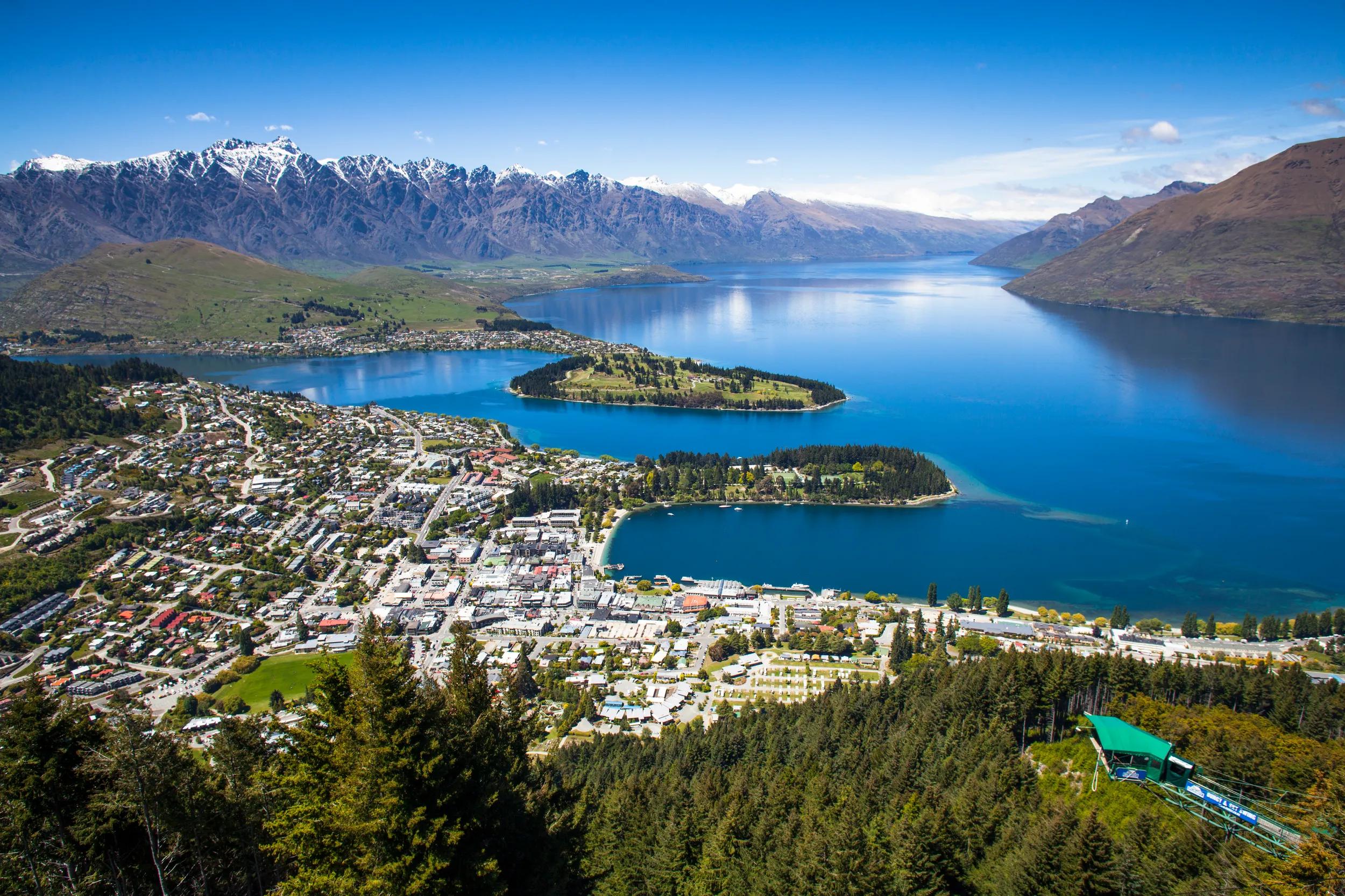 High view point of Queenstown looking over lake and mountains