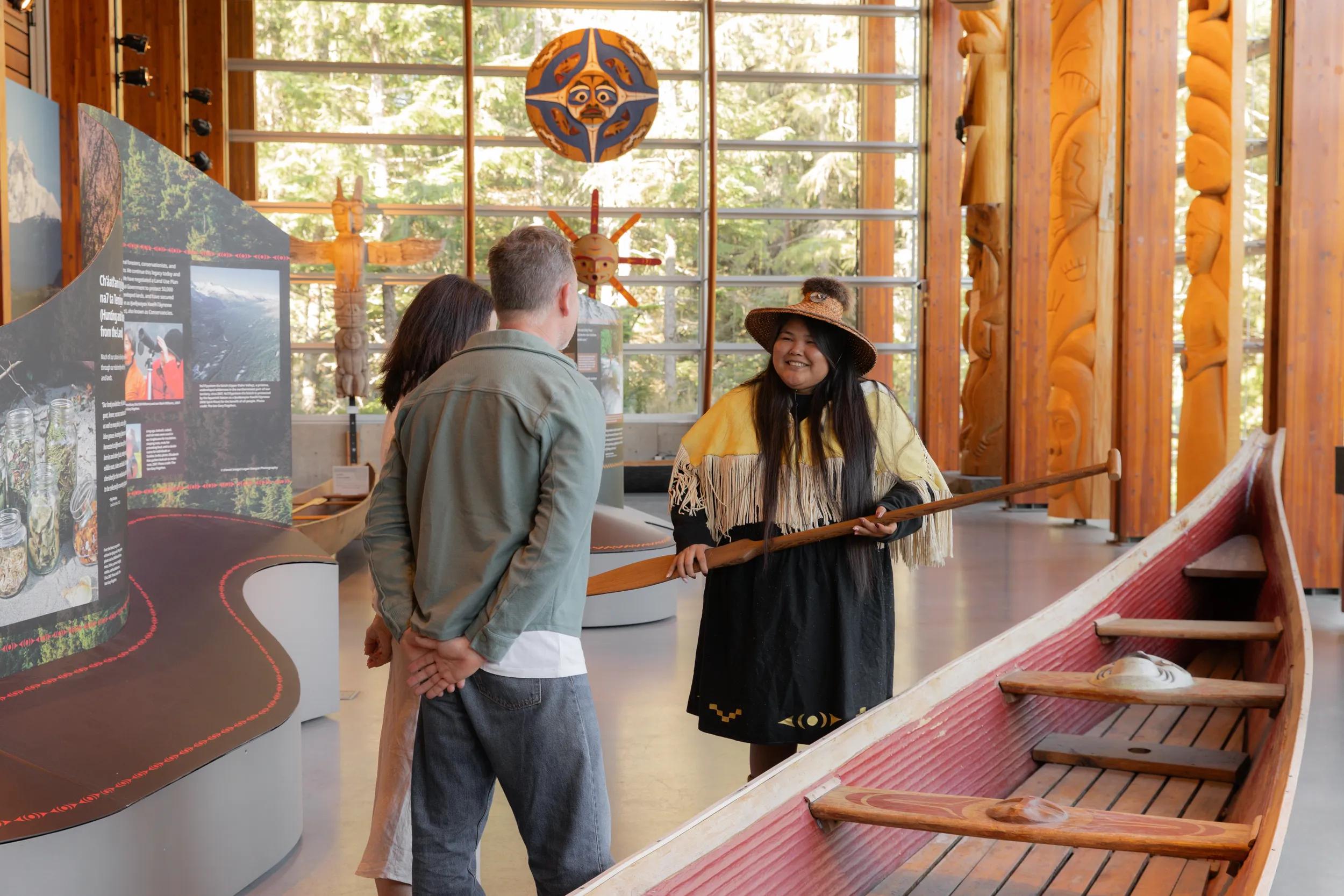 Cultural Ambassador Georgina  leading a tour at the Squamish Lil'wat Cultural Centre, Whistler, Canada.