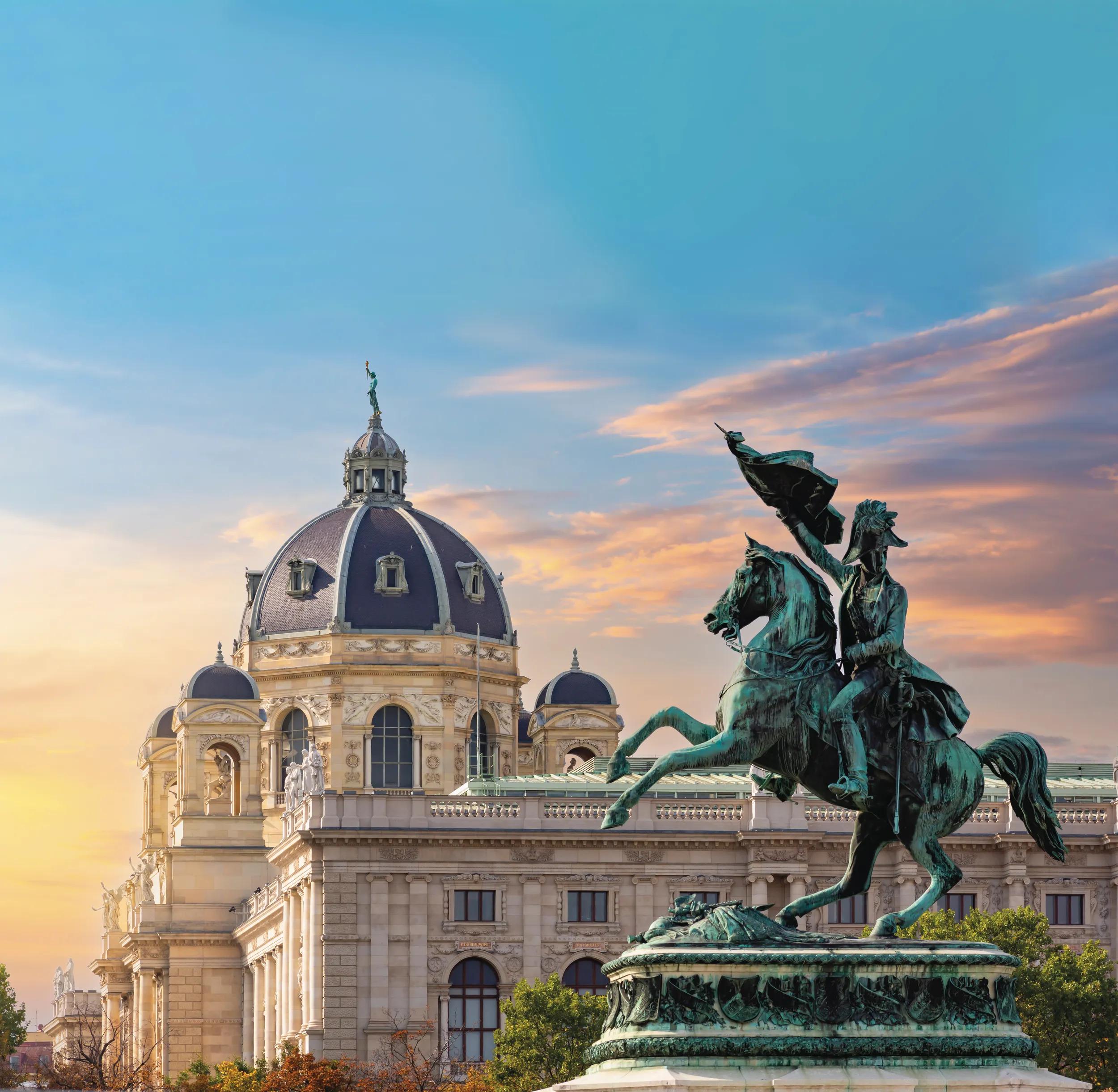 Statue of Archduke Charles on Heldenplatz square and Museum of Natural History dome, Vienna, Austria