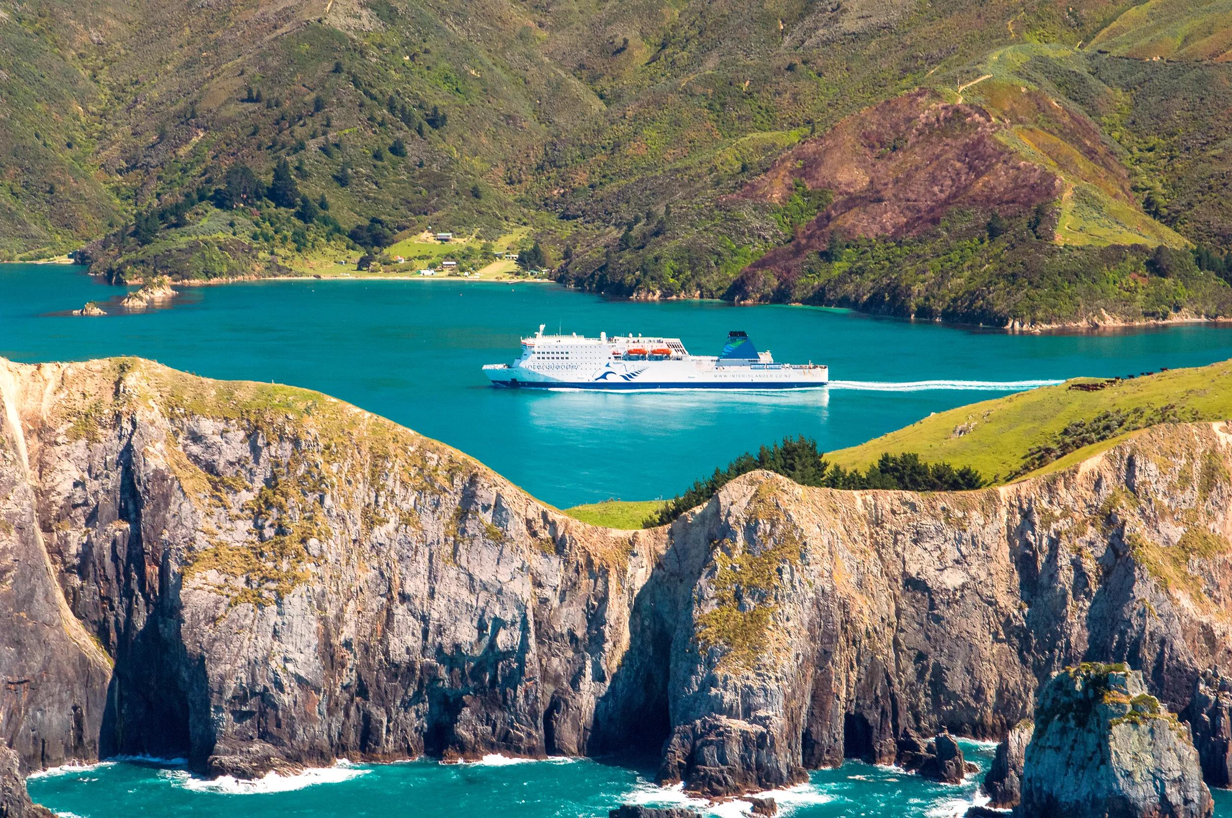 Interislander's MV Kaitaki passing through Whekenui Bay on the north coast of South Island, NZ.
