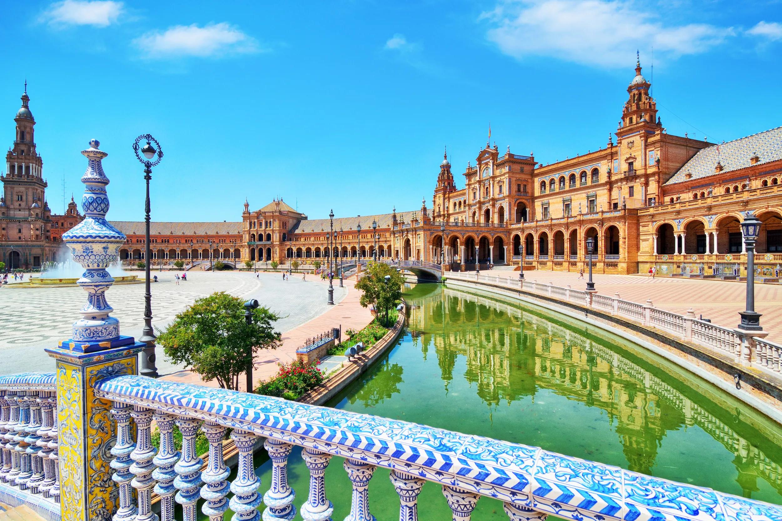 The Plaza de Espana, built in 1928, is a plaza in the Parque de Maria Luisa in Seville, Spain