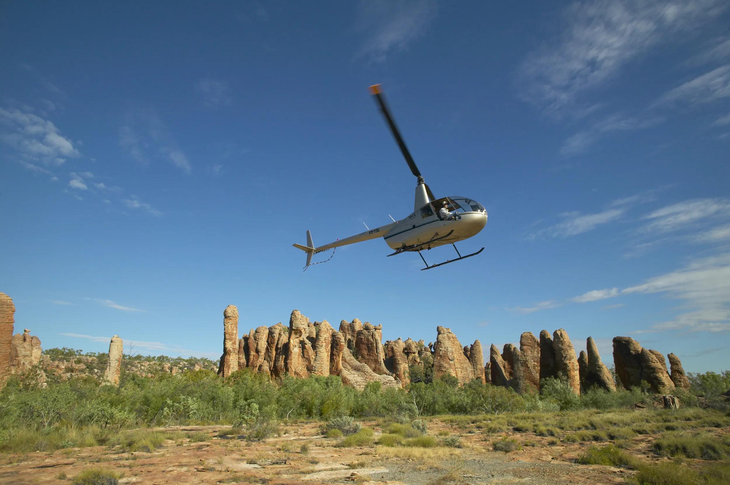 A helicopter takes off at Limmen National Park's Lost City.The Gulf region is known for its rivers and this is reflected in the drive through Limmen National Park, which crosses four major rivers and follows a fifth, the Roper River. It is a paradise for anglers and birdwatchers with a diversity of landscapes makes the drive through the park varied and interesting.