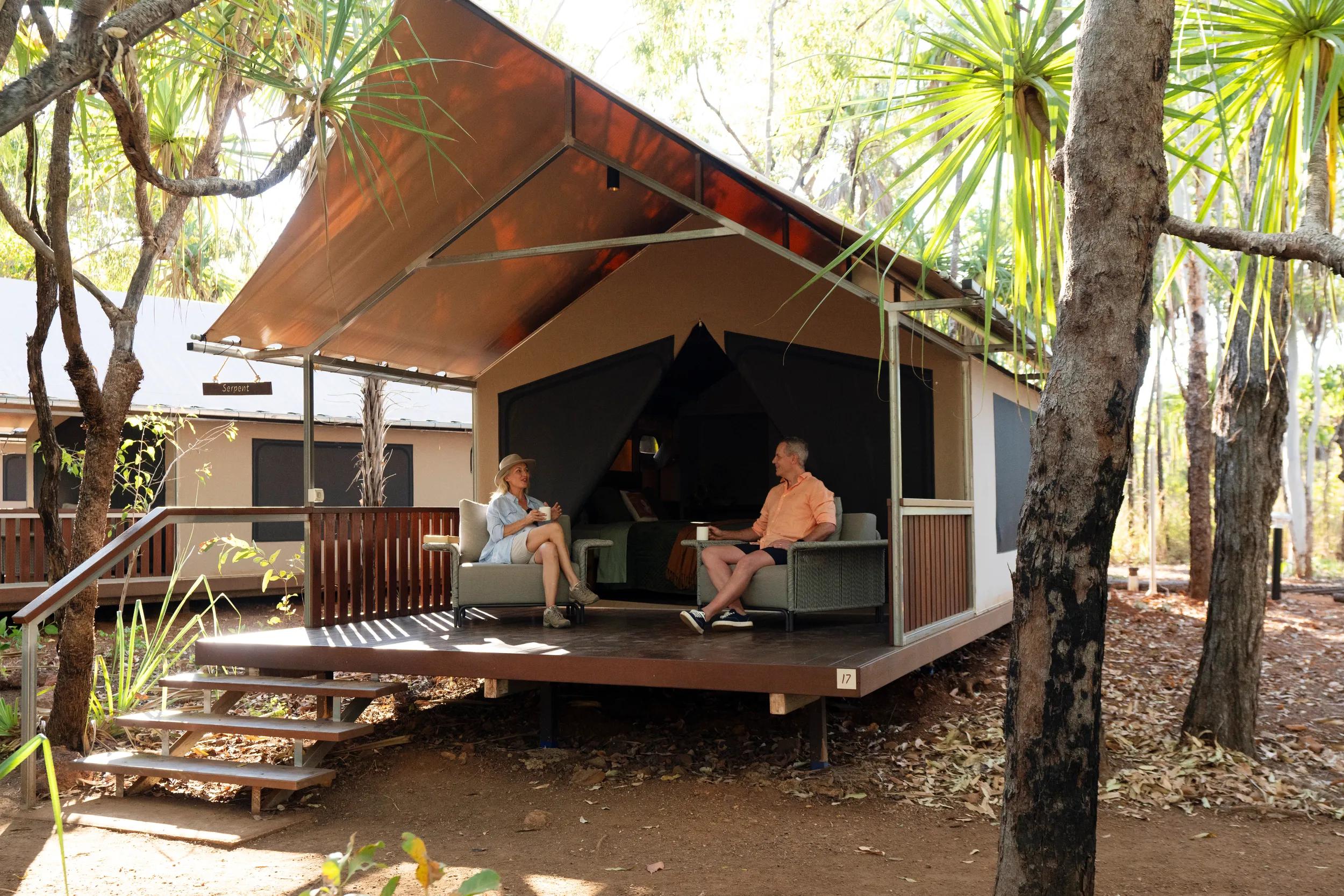 Lodge Accommodation - couple sitting on a deck - APT - Mitchell Falls photo shoot 2024.