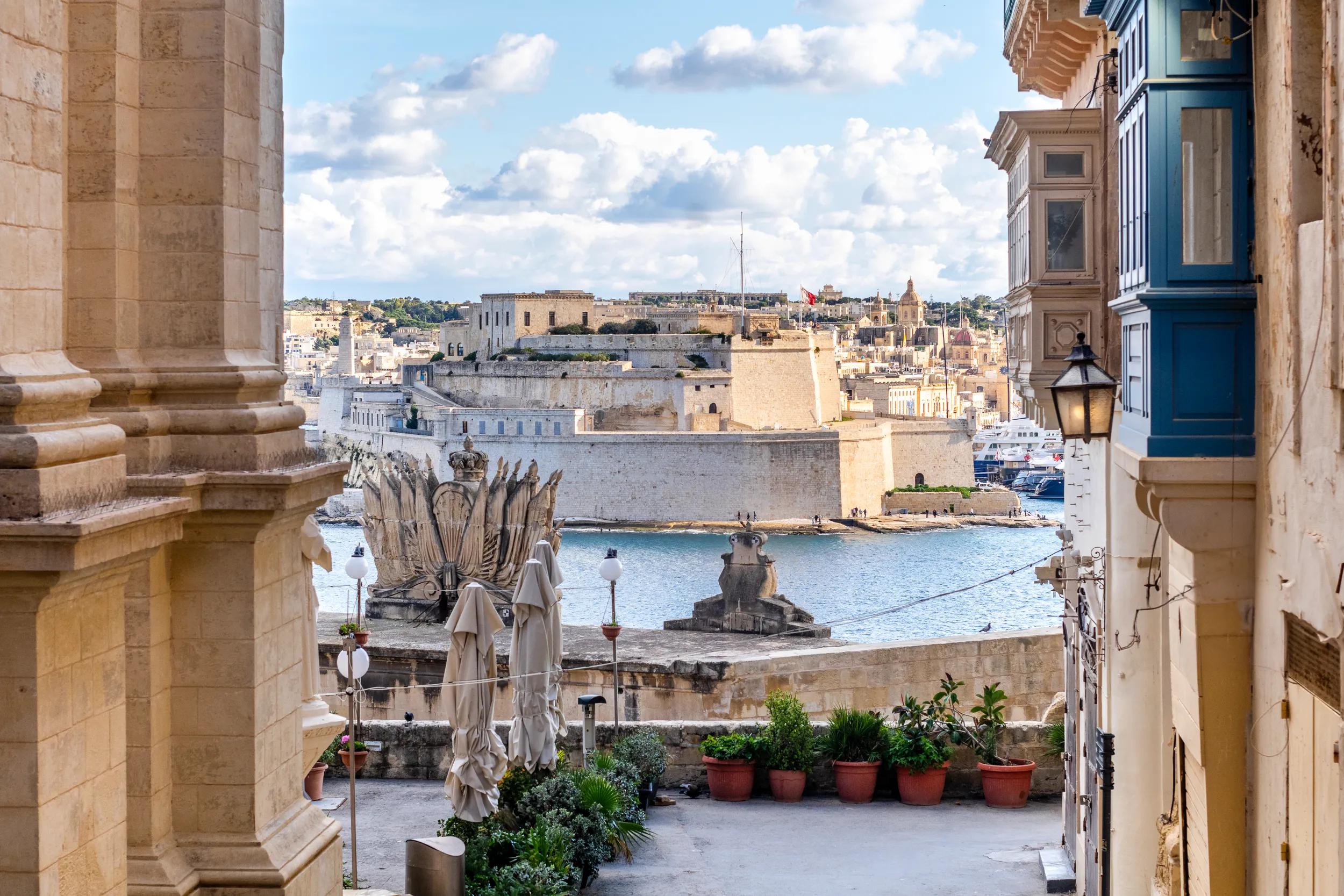 Saint Angelo Fortress a taken from charming street of Valletta, Malta.