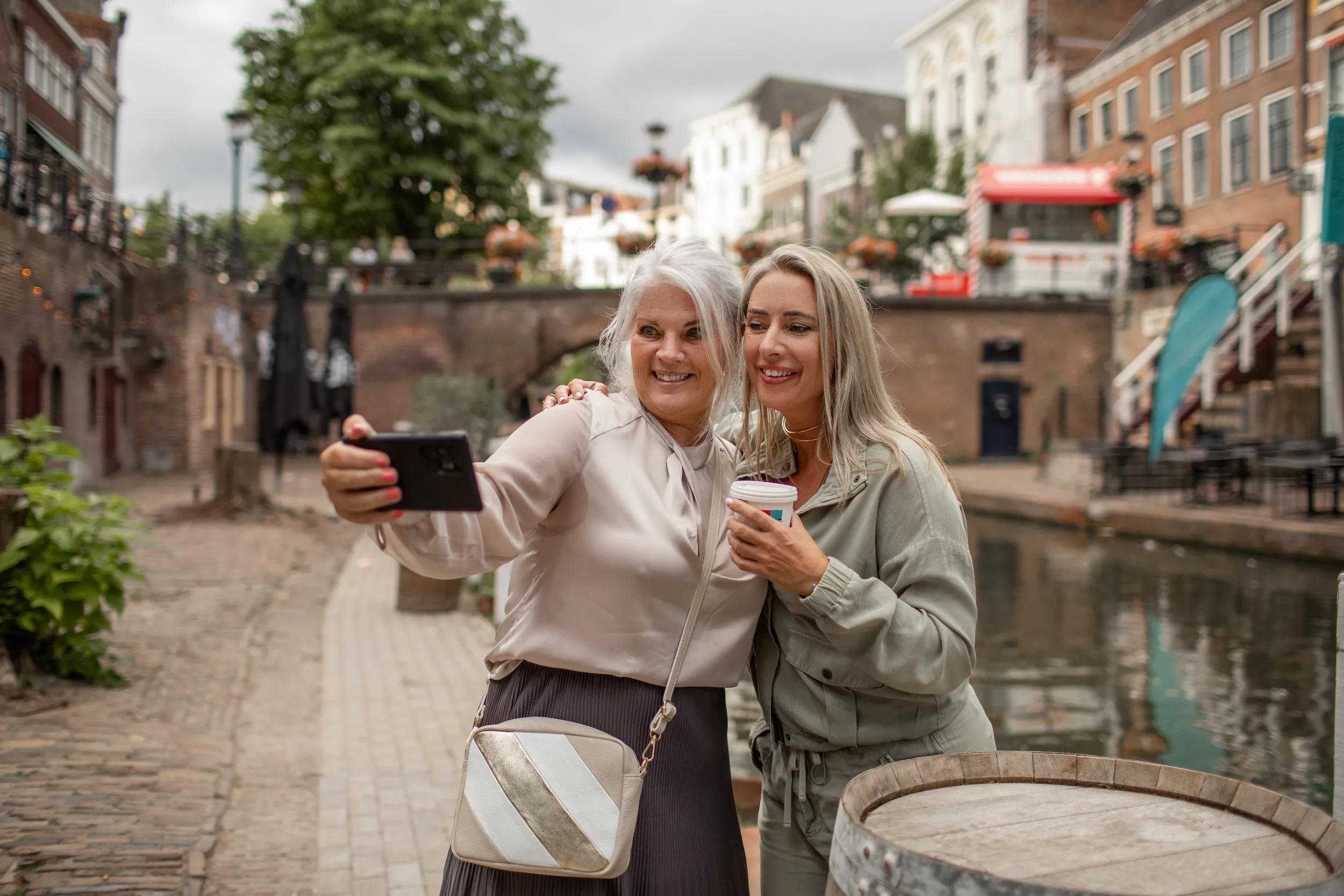 Happy Senior Female Traveller with female family member in Utrecht
