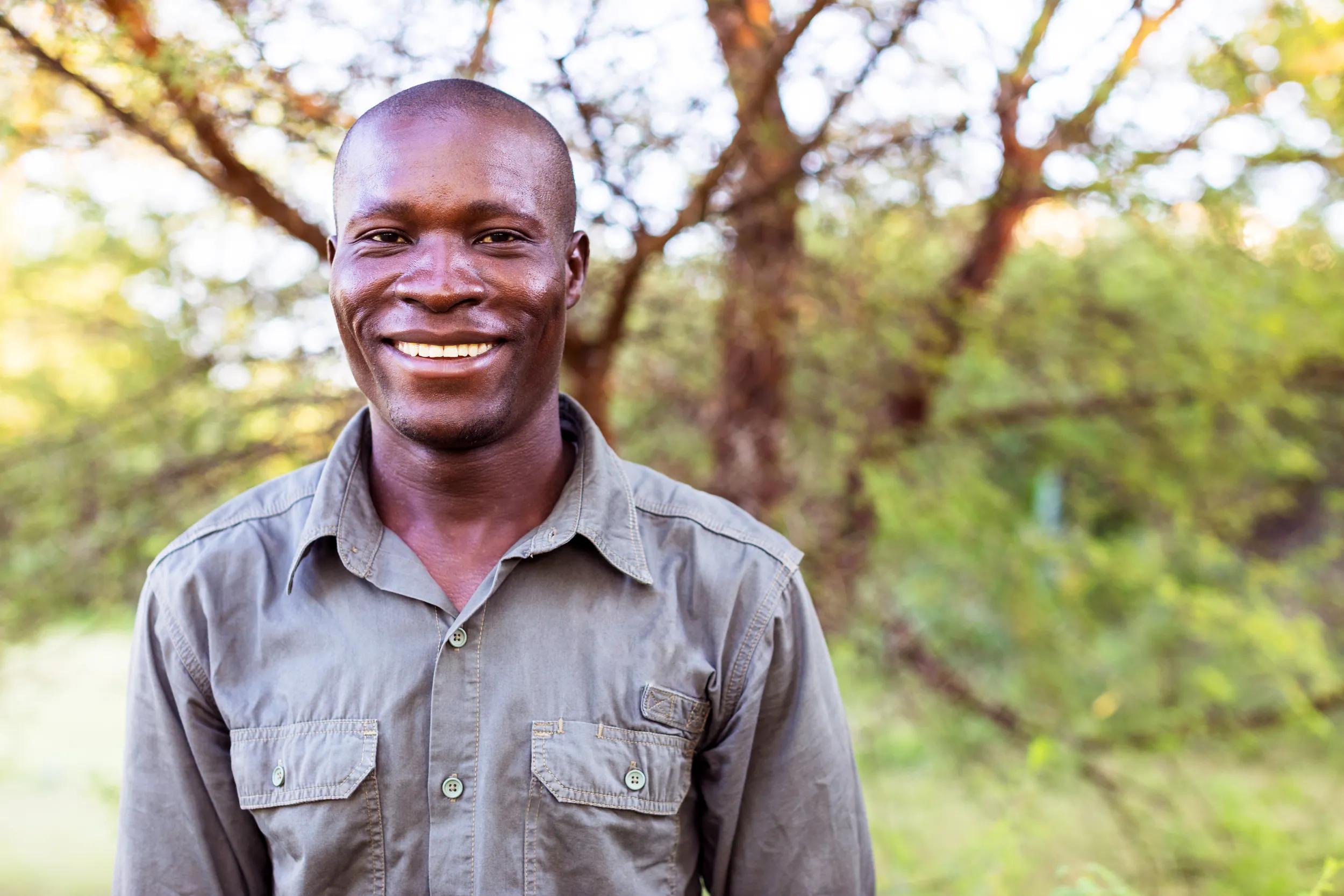 Africa, Officers, Uniform - African Forest Ranger Smiling at the Camera for a Portrait
