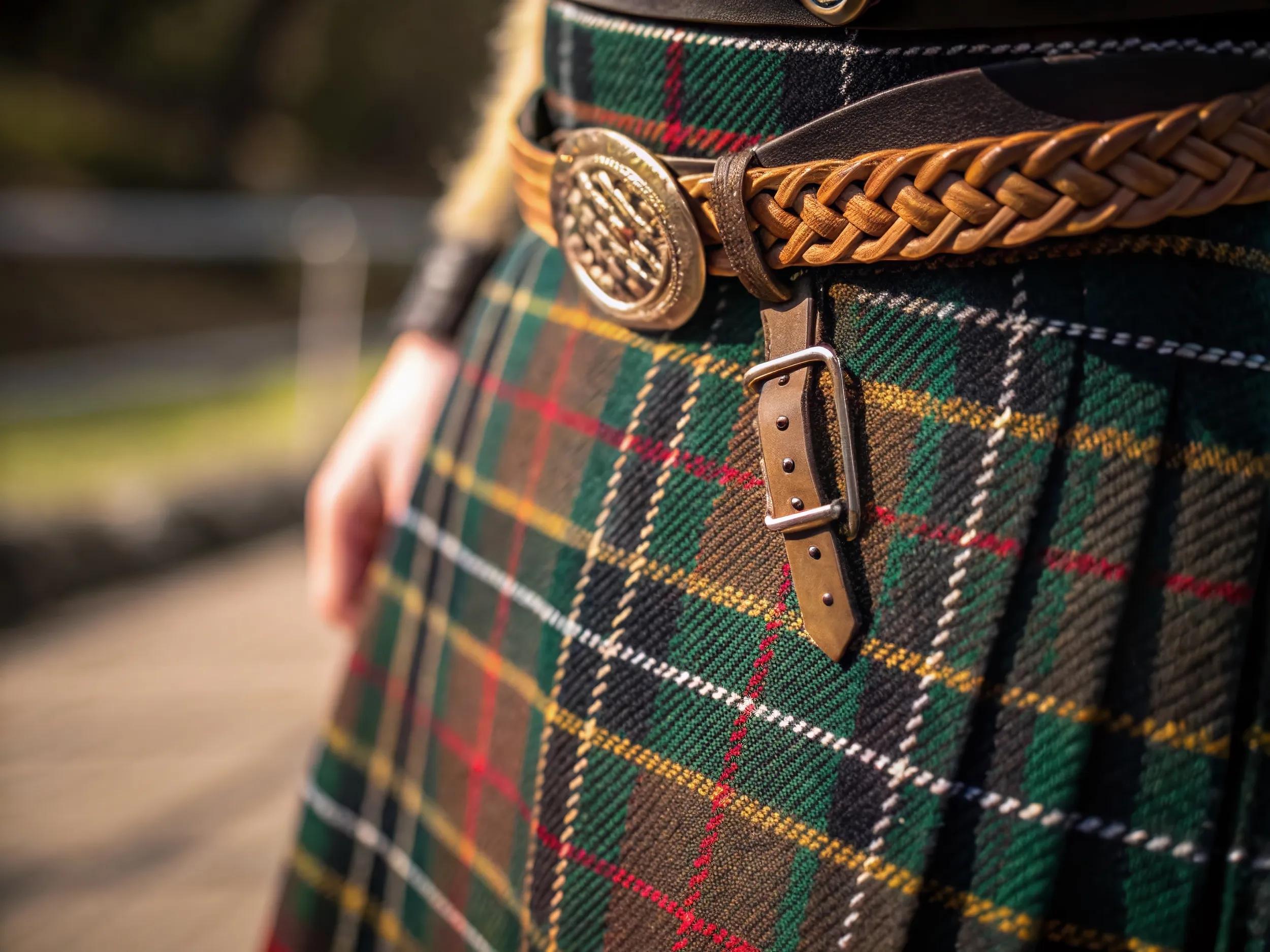 Close-up, Bokeh-Effect Photo: Scottish Kilt's Tartan Fabric & Belt Detail