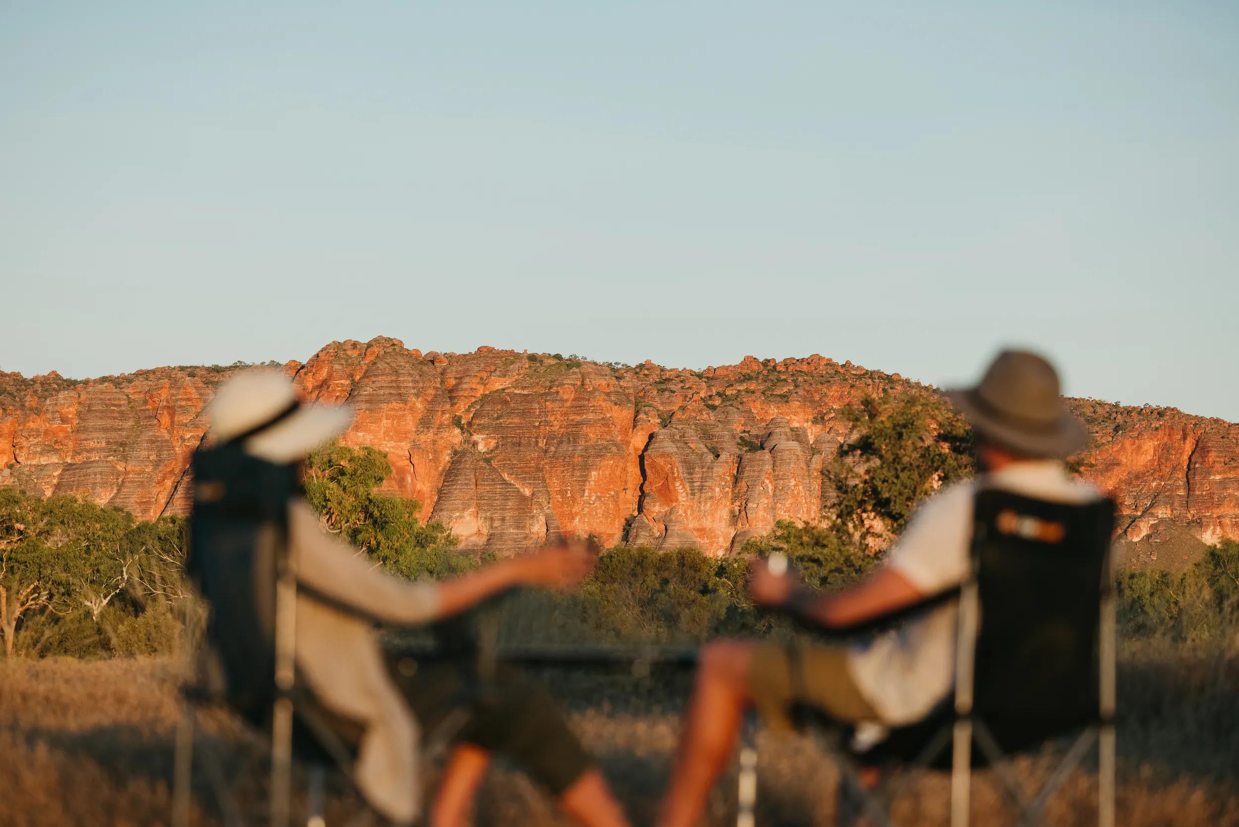 Couple exploring the Bungle Bungle Range, Purnululu National Park.