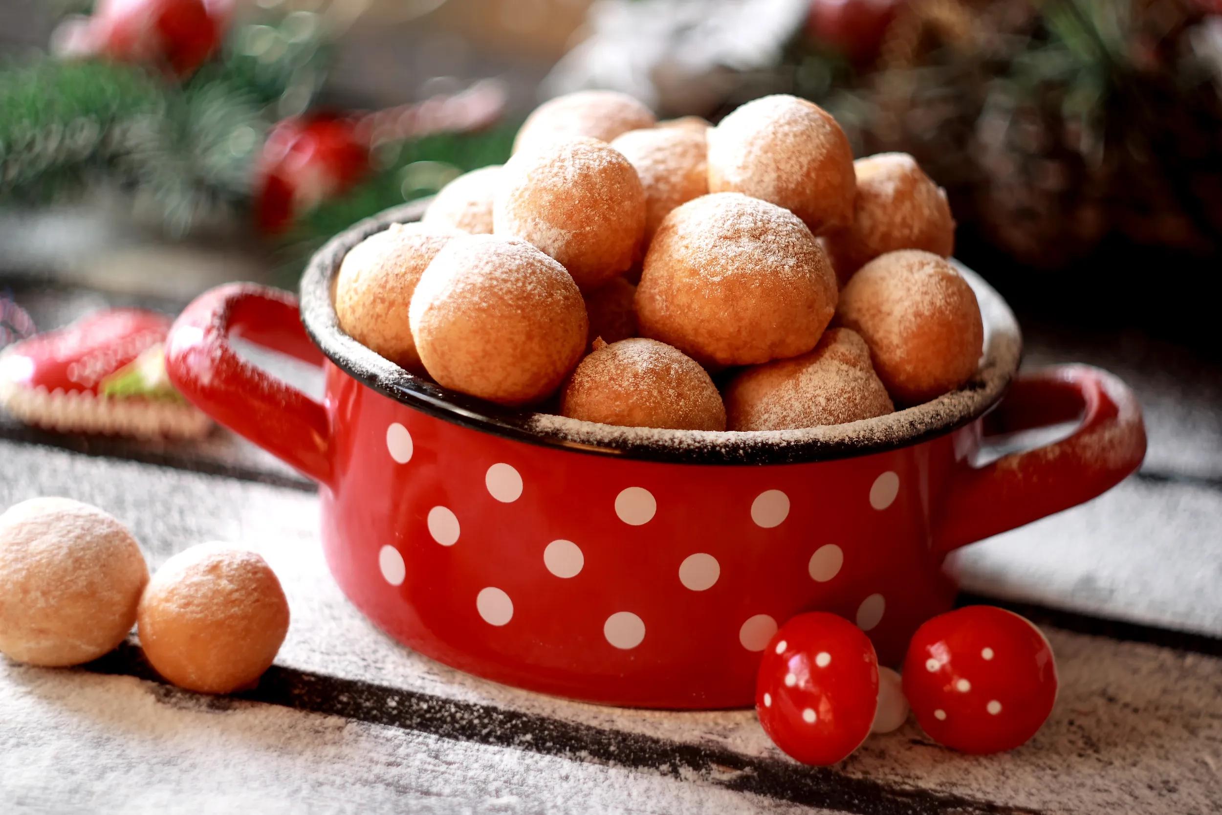 Fritule - Croatian mini doughnuts. Selective focus.