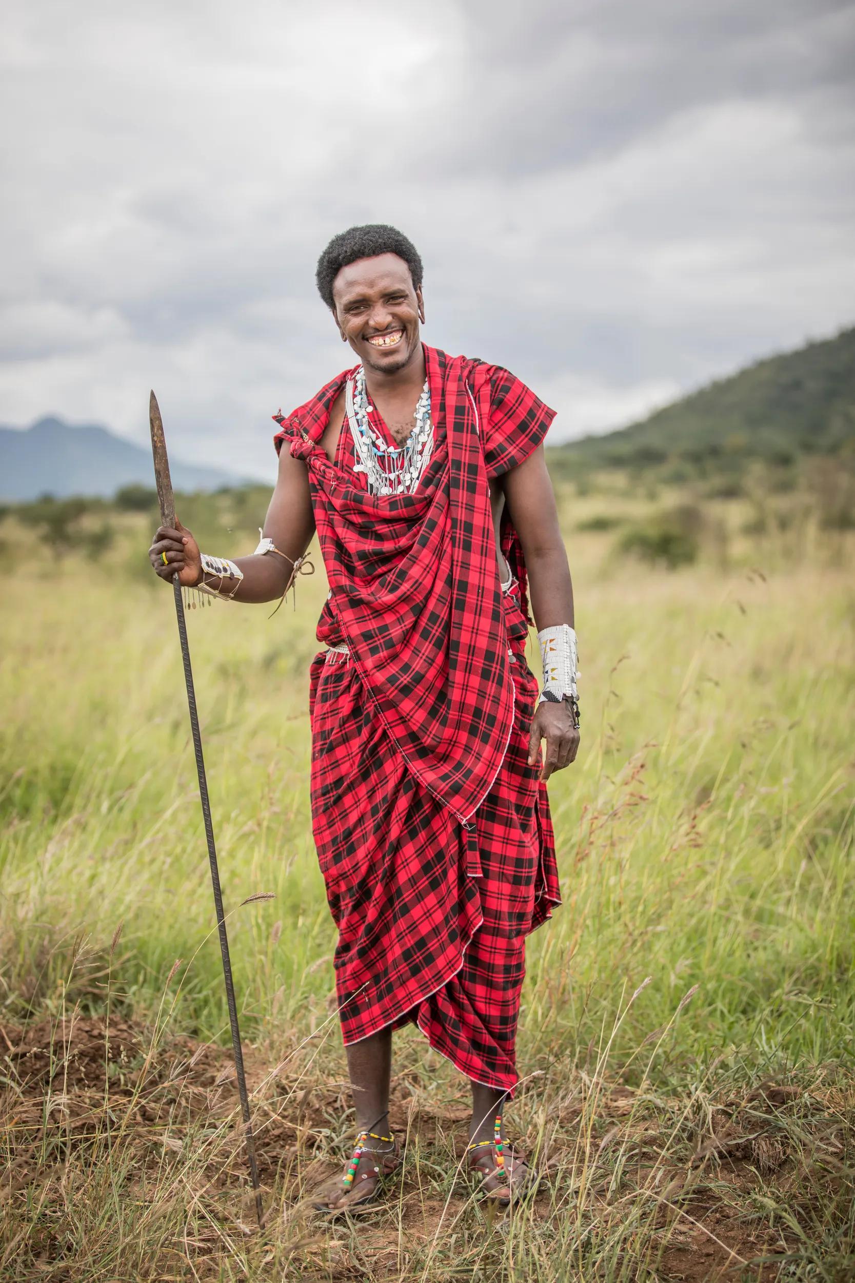 young and handsome maasai warrior in traditional clothing