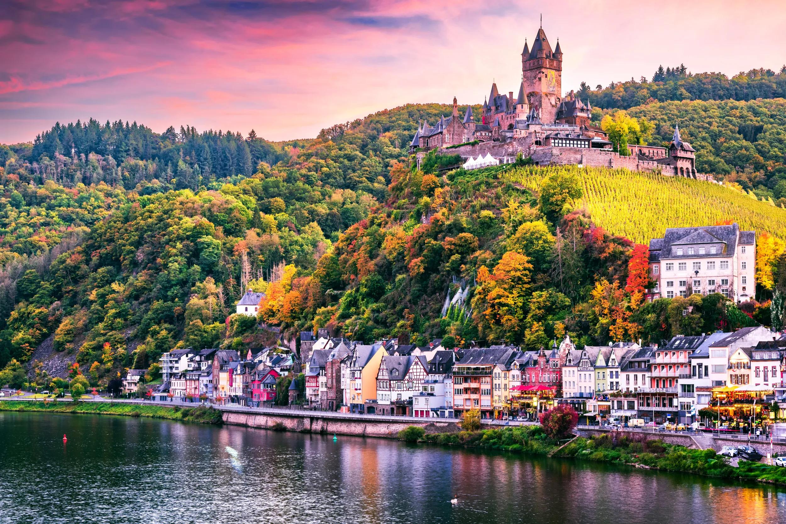 Cochem, Germany. Colored autumn landscape with romantic Moselle River valley, Rhineland-Palatinate german land.