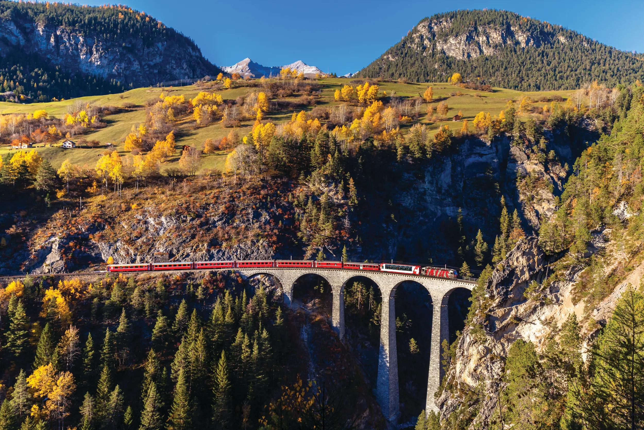 The Rhaetian Railway on the Landwasser Viaduct over the Landwasser River, just before arriving in Filisur.