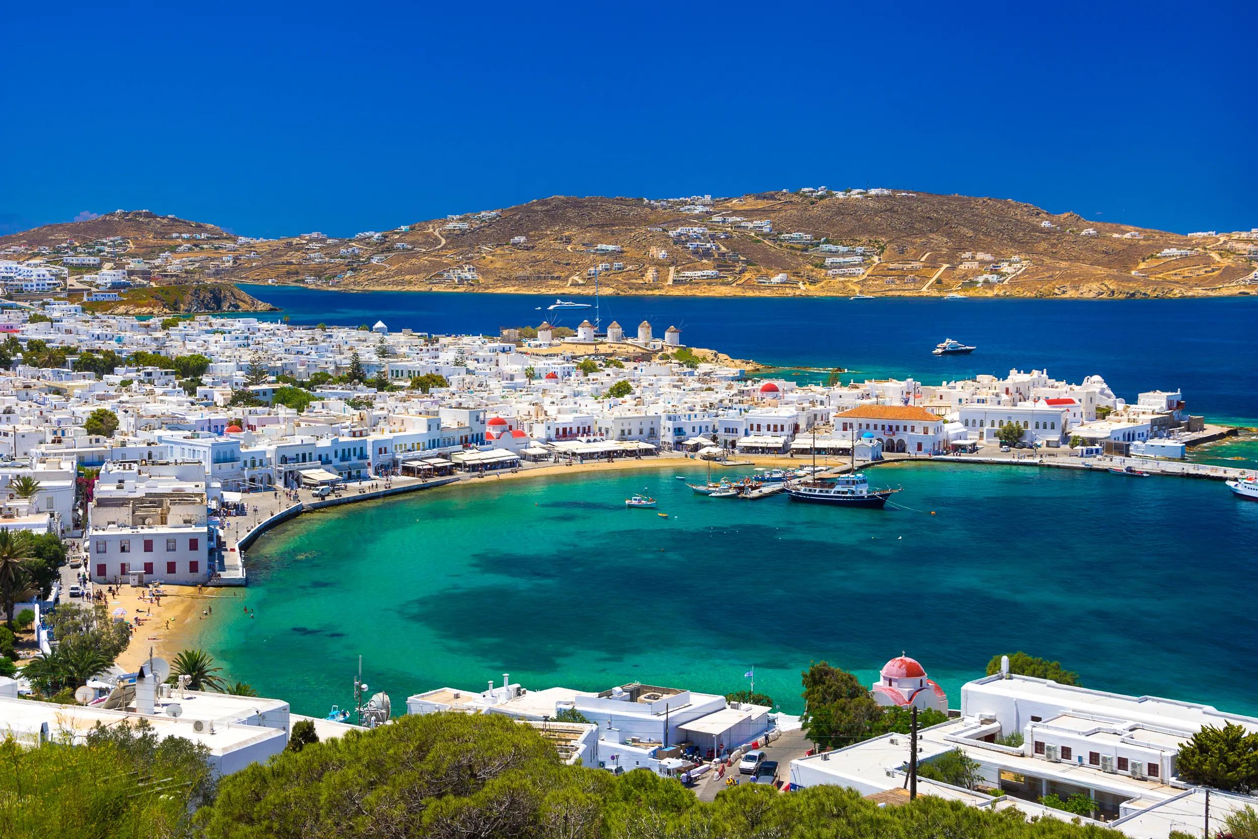 Mykonos port with boats and windmills, Cyclades islands, Greece