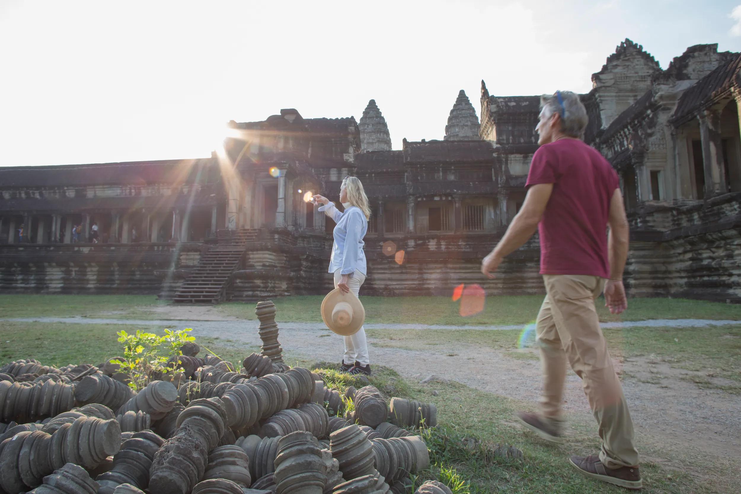 Her husband is walking towards her.