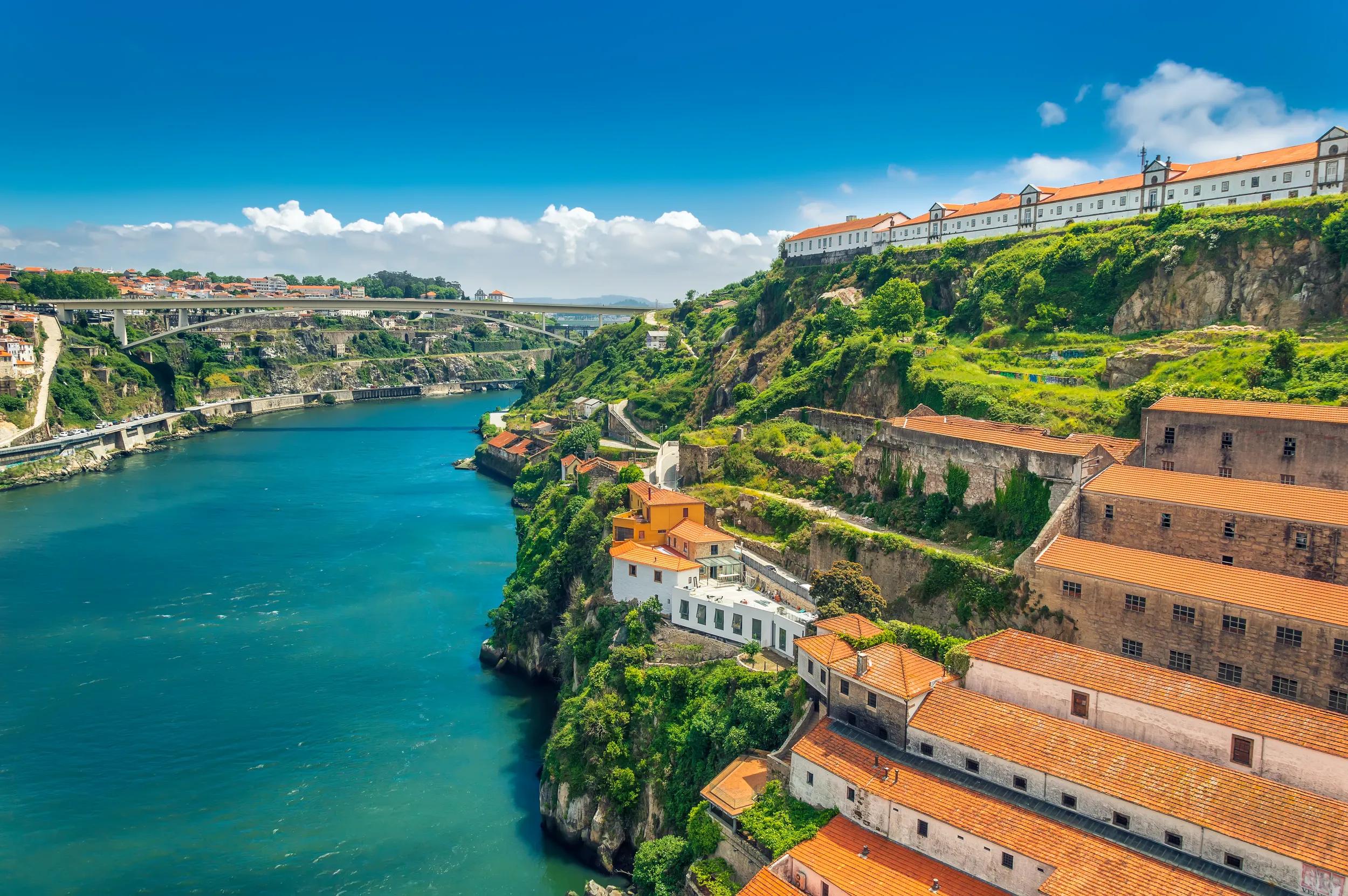 t-eu-portugal-porto-hills-of-vila-nova-de-gaia-with-douro-river-1148239541-g-rf