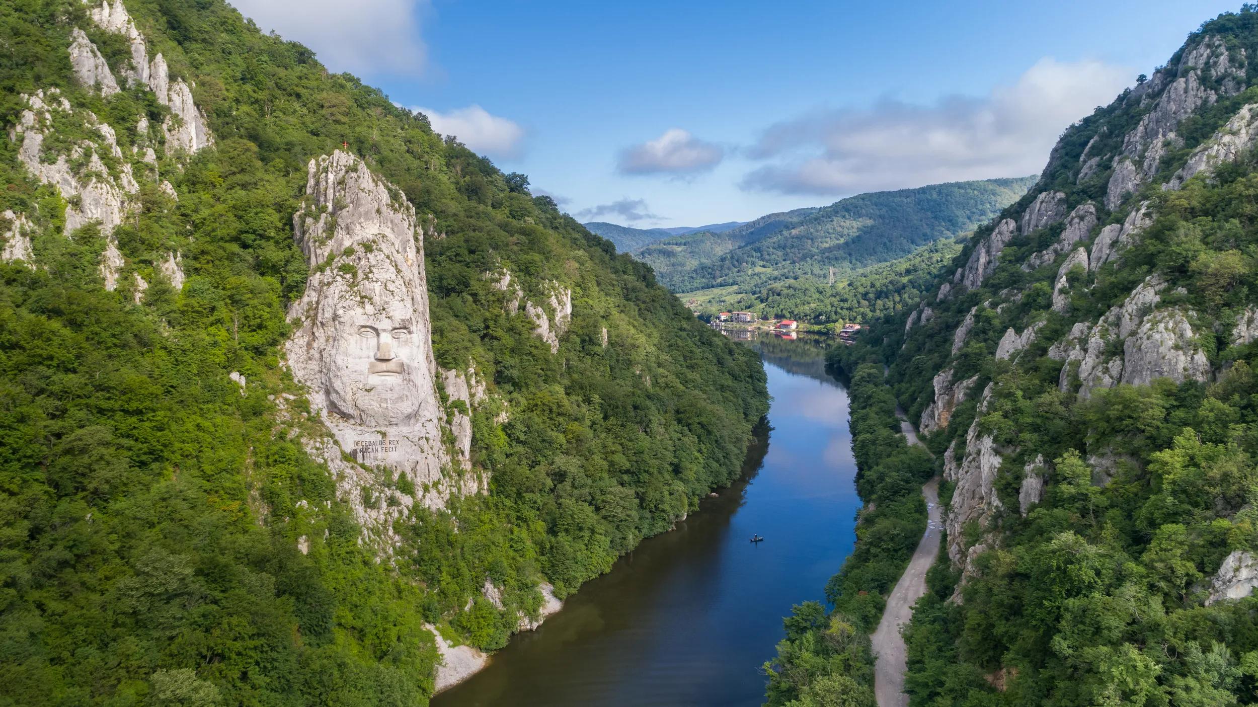 Decebal Head sculpted in rock, Danube Gorges (Cazanele Dunarii) , Romania. Aerial view.