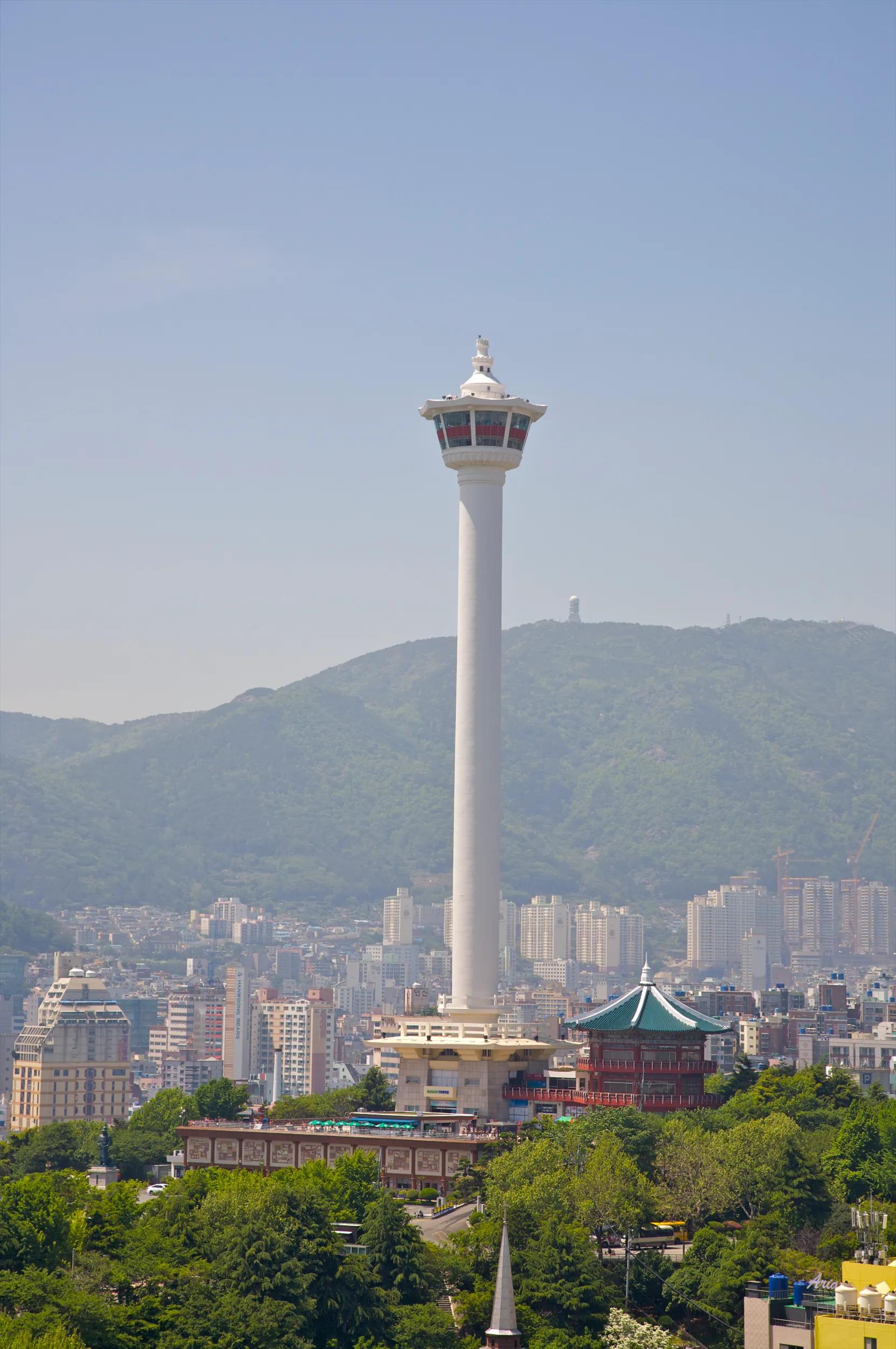 Busan Tower, a 118-metre-high tower built in 1973 at Yongdusan Park, located in Jung-gu, Busan, South Korea.  Climb the 387-foot tall tower to get spectacular city views.  Park is also home to various attractions, including Museum of Folk Musical Instruments and Youngdusan Art Museum.