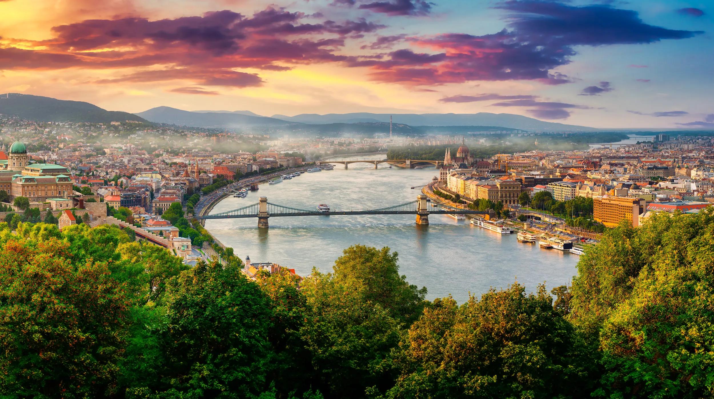 Panoramic view from above on landmarks of Budapest at summer sunset, Hungary