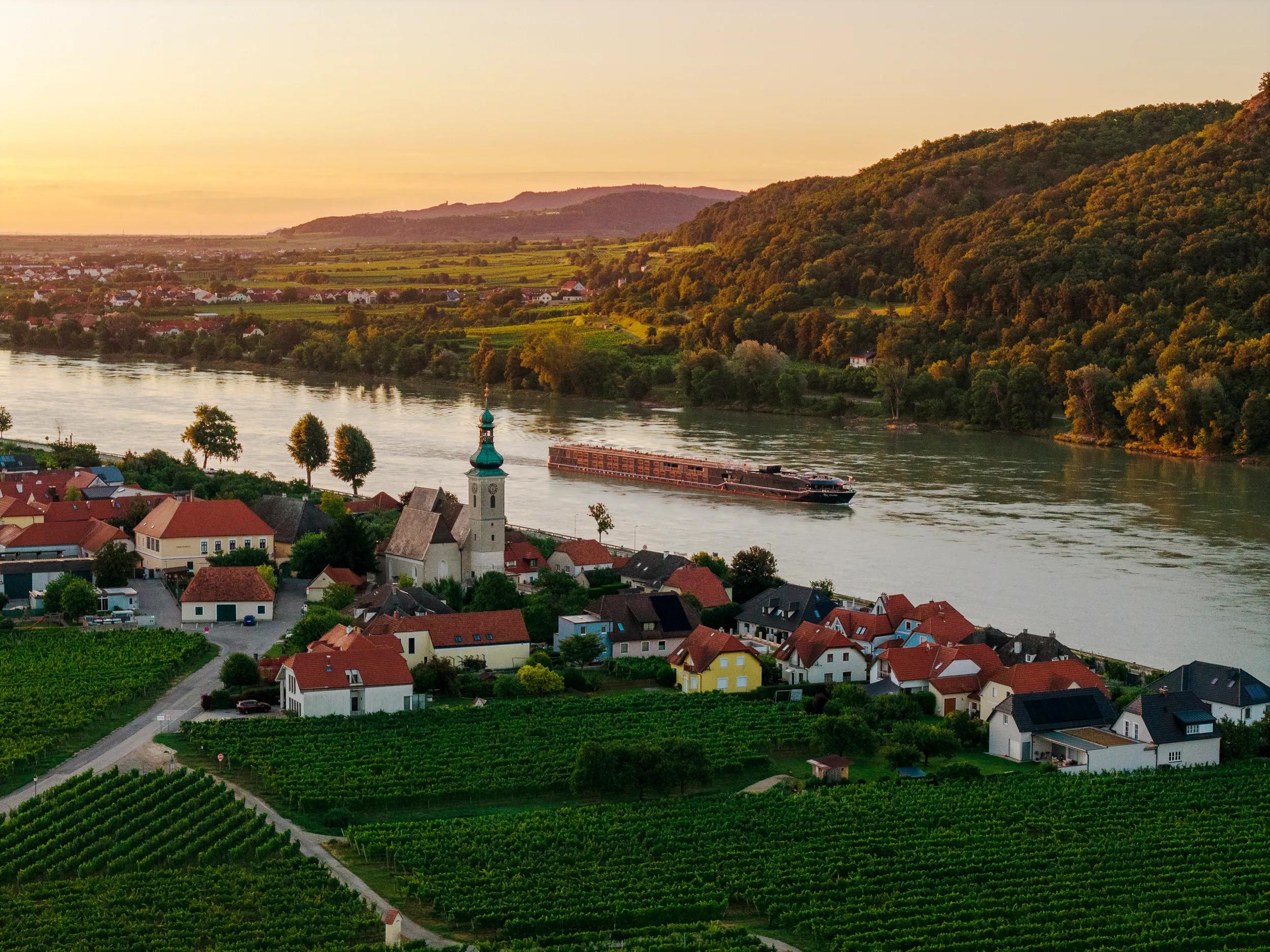 APT Solara Ship underway, drone aerial still, on the Danube River between Durstein and Melk, Austria.