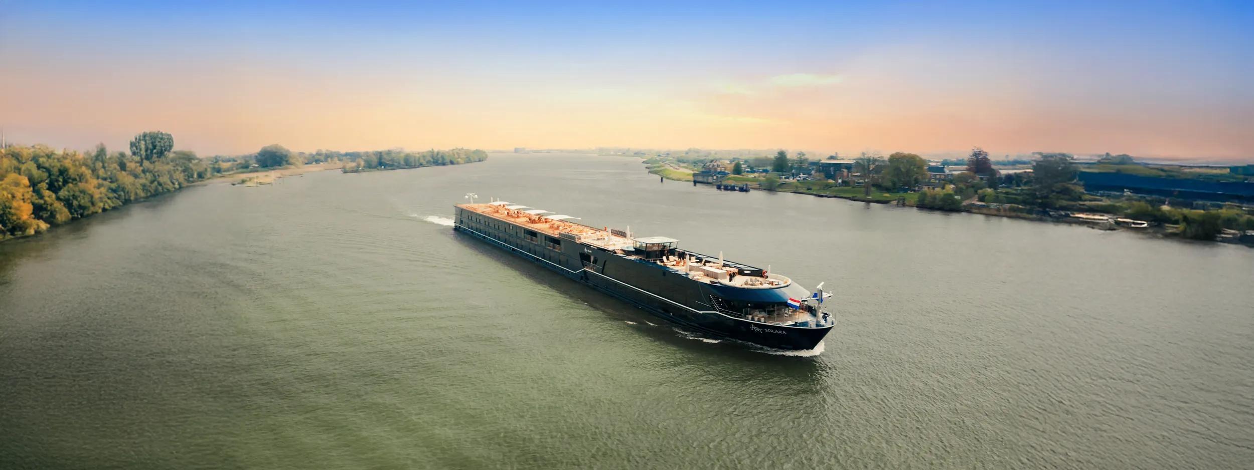 APT Solara ship exterior aerial. Sides extended. Still from drone footage.