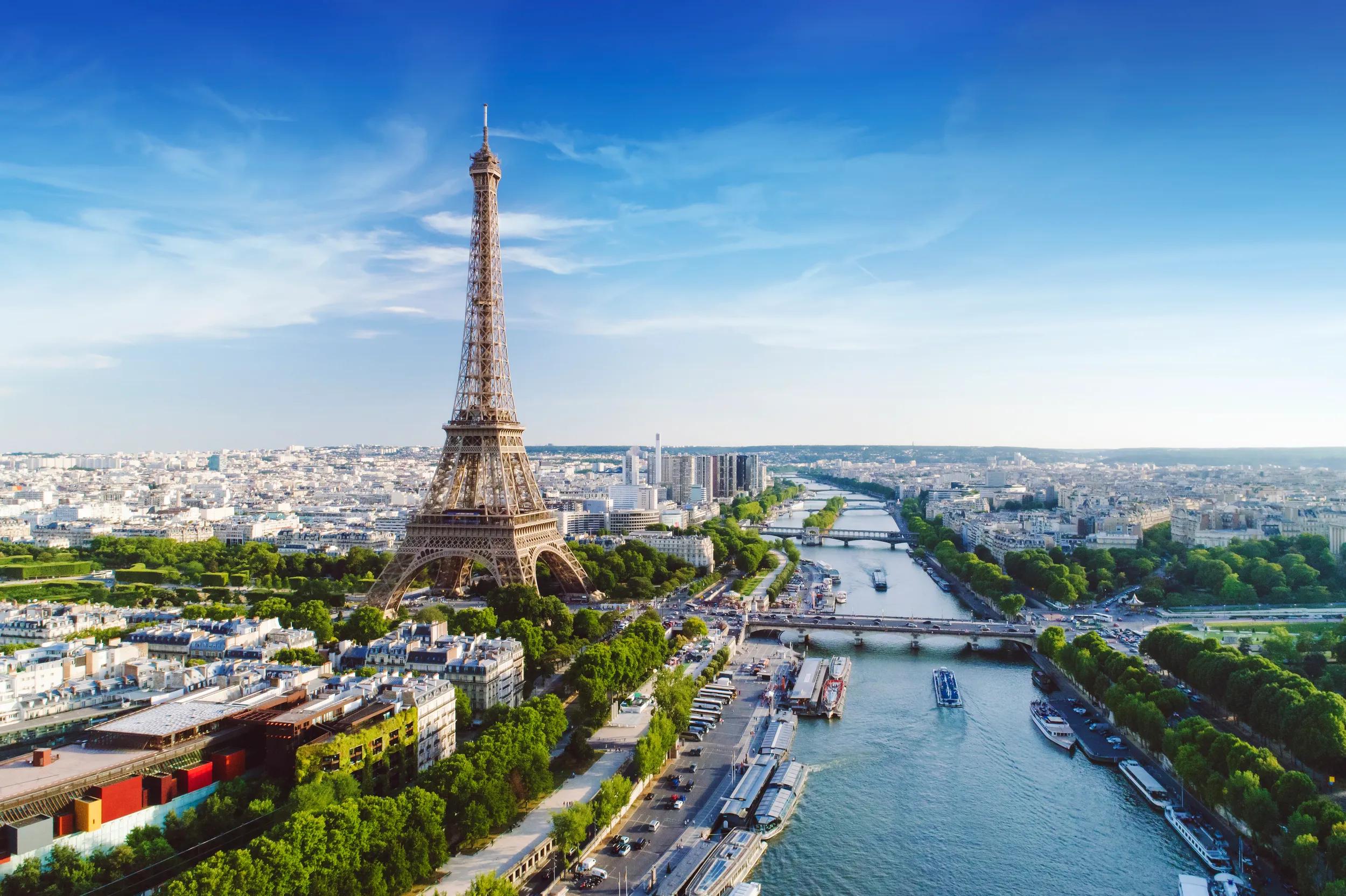 Aerial view of Paris with Eiffel tower during sunset