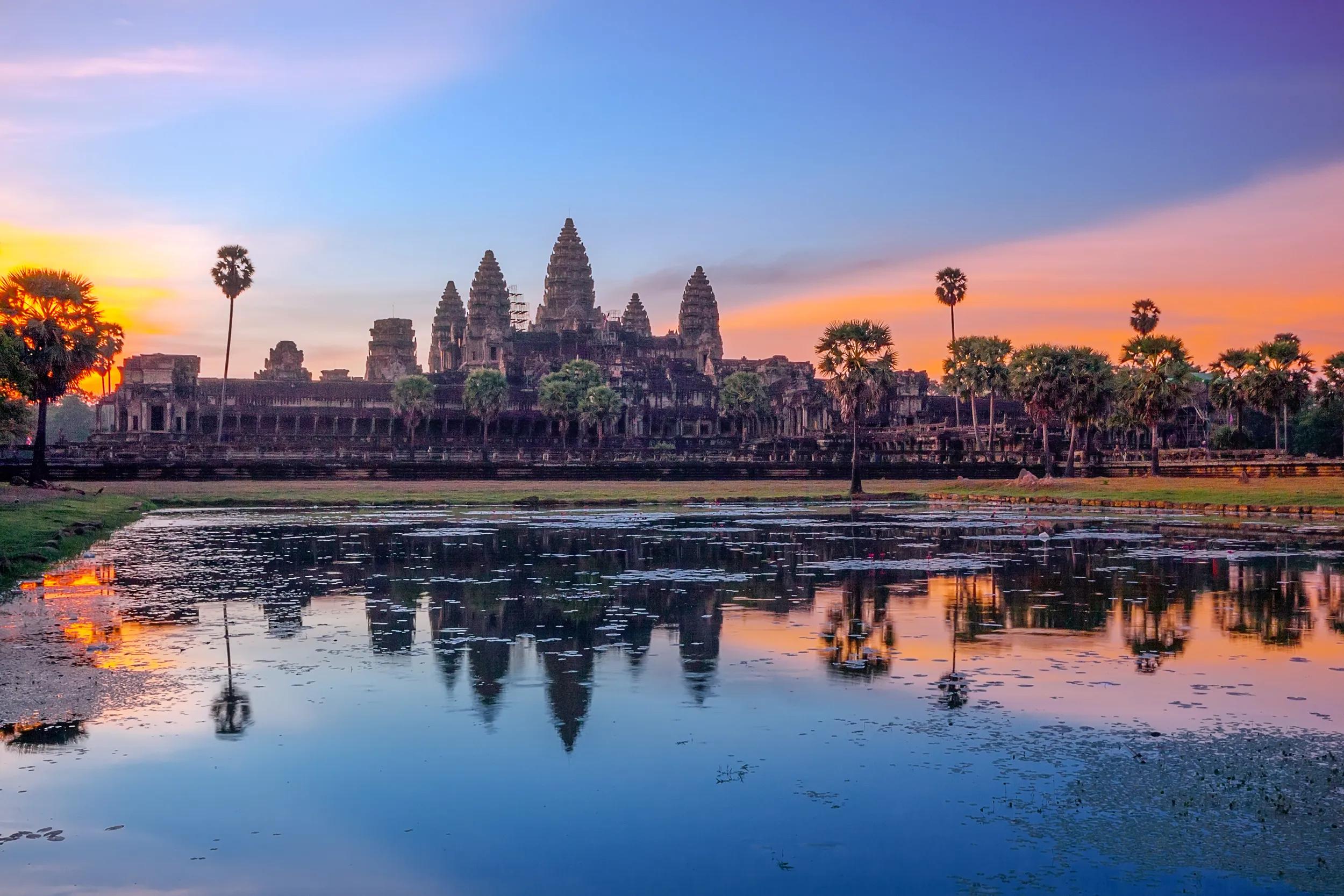 Angkor Wat, located in Siem Reap, Cambodia, is the world's largest religious monument and an iconic symbol of the country. It became a Buddhist temple toward the end of the 12th century despite the orignal intention was built as a Hindu temple of god Vishnu for the Khmer Empire.