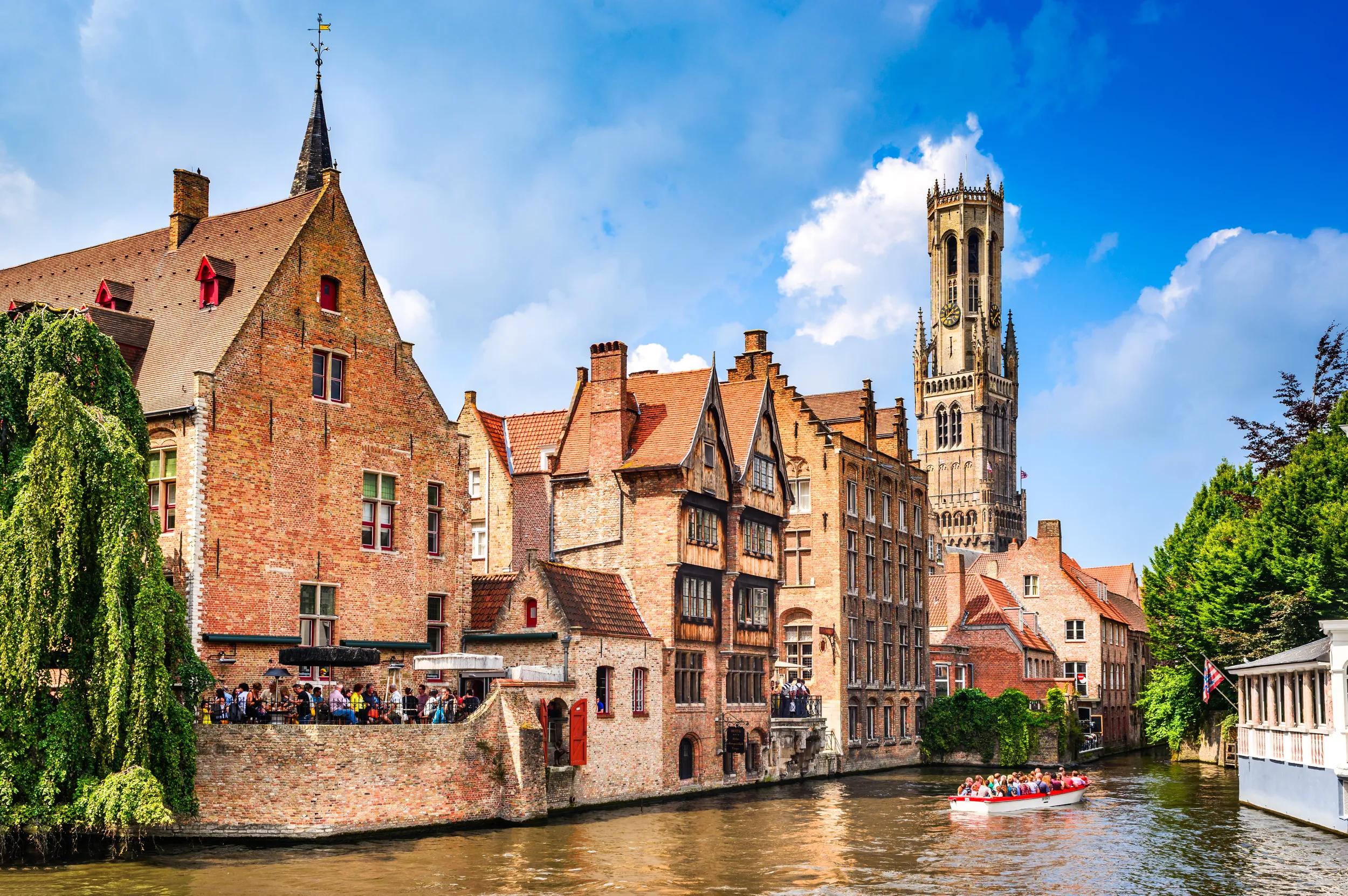 BRUGES, BELGIUM - 7 August 2014: Scenery with water canal in Bruges, "Venice of the North", cityscape of Flanders, Belgium.