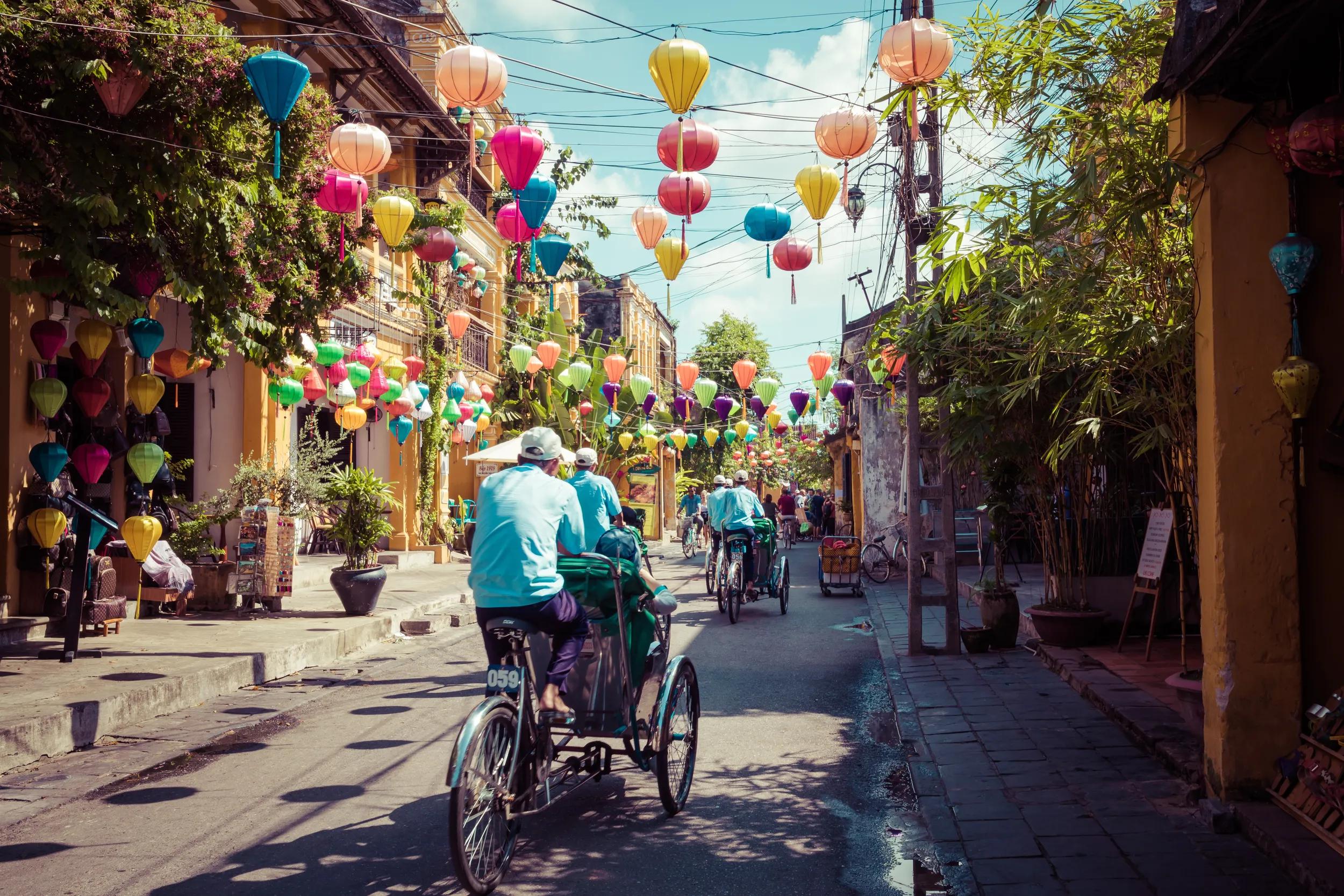 HOI AN, VIETNAM - NOVEMBER 21, 2018: Hoian Ancient town houses. Colourful buildings with festive silk lanterns. UNESCO heritage site. Vietnam...